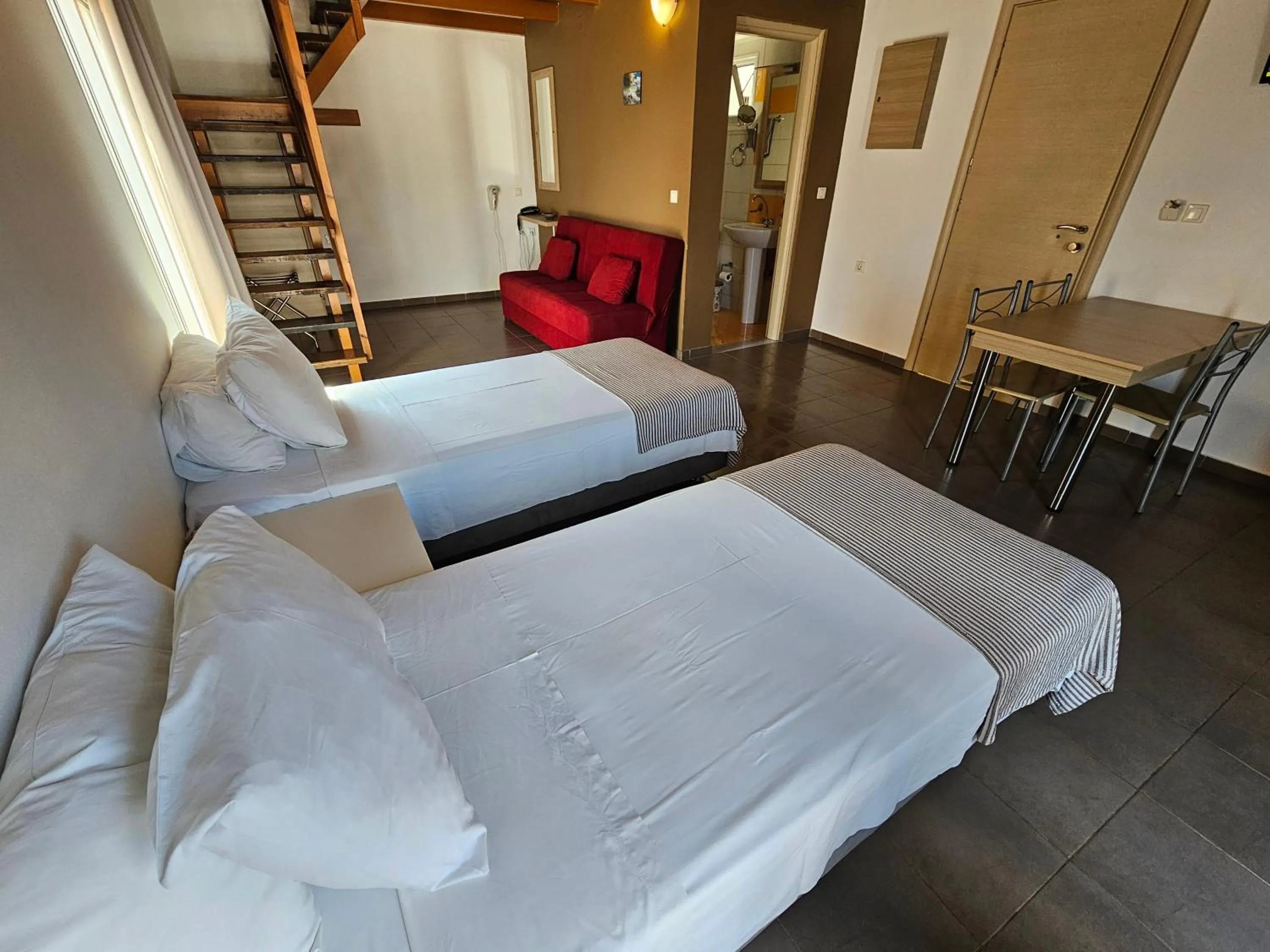 Bedroom, Bed in Elounda Sunrise Apartments