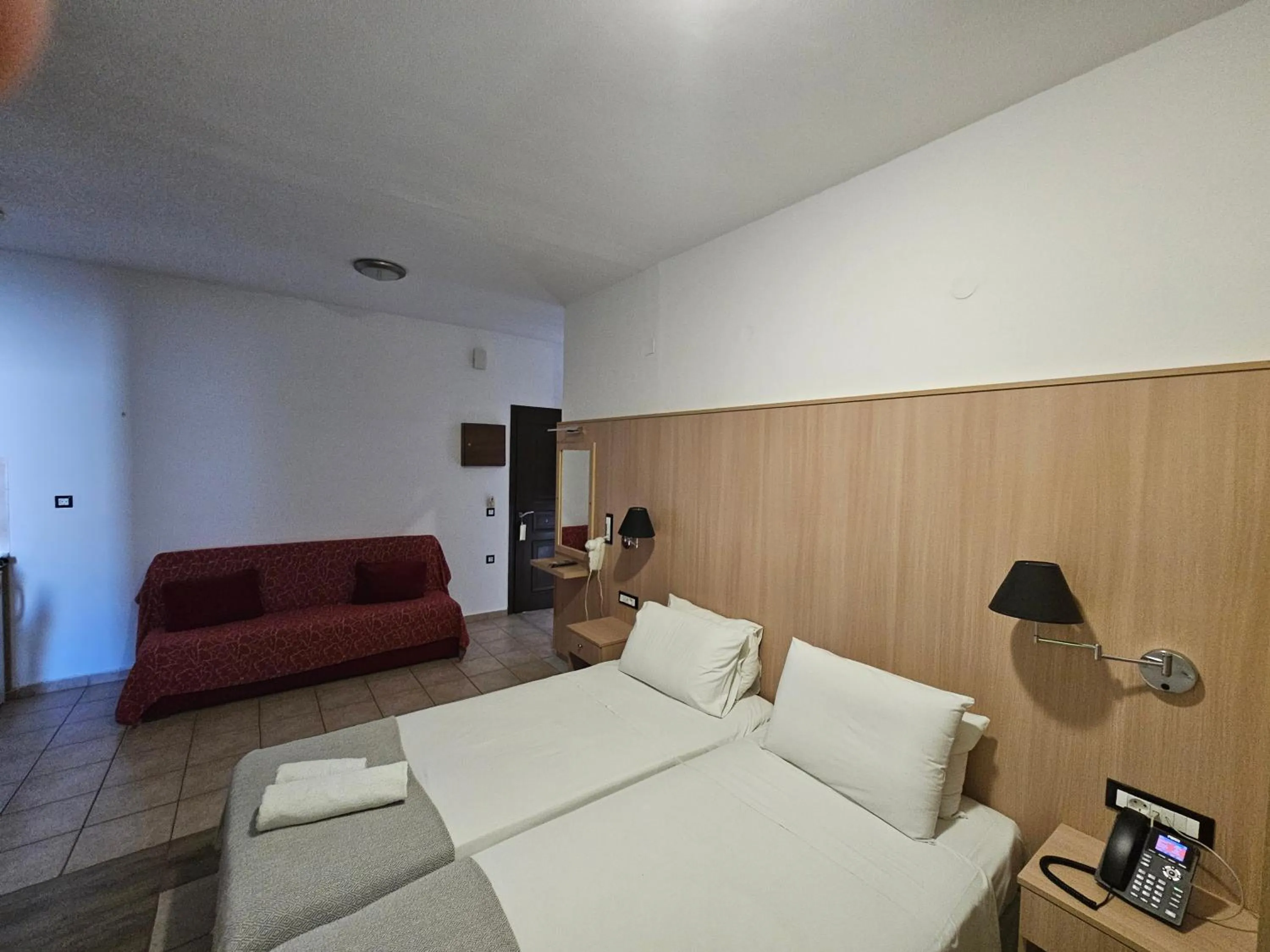 Bed in Elounda Sunrise Apartments