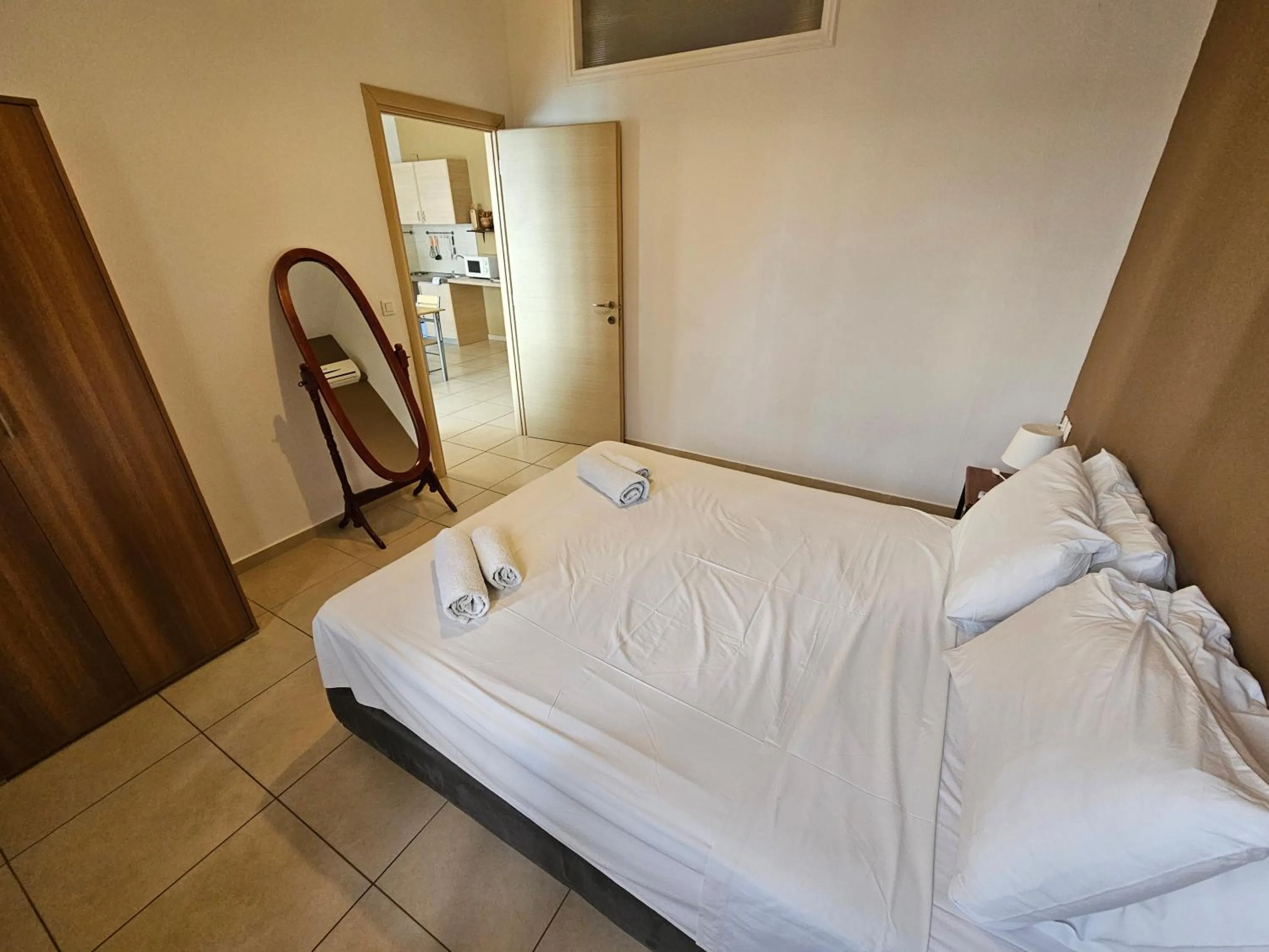 Bed in Elounda Sunrise Apartments