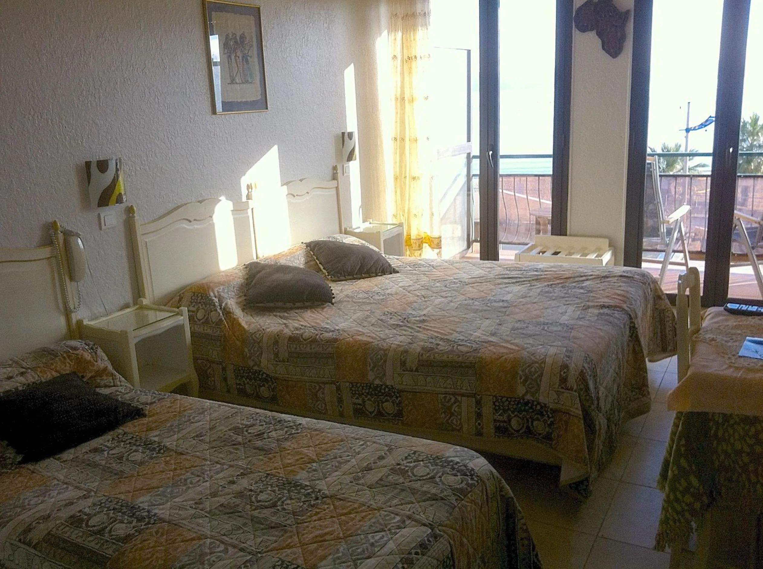 Bed in Hôtel Les Alizés