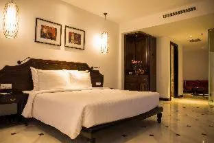 Bed in The Palmy Phu Quoc Resort & Spa