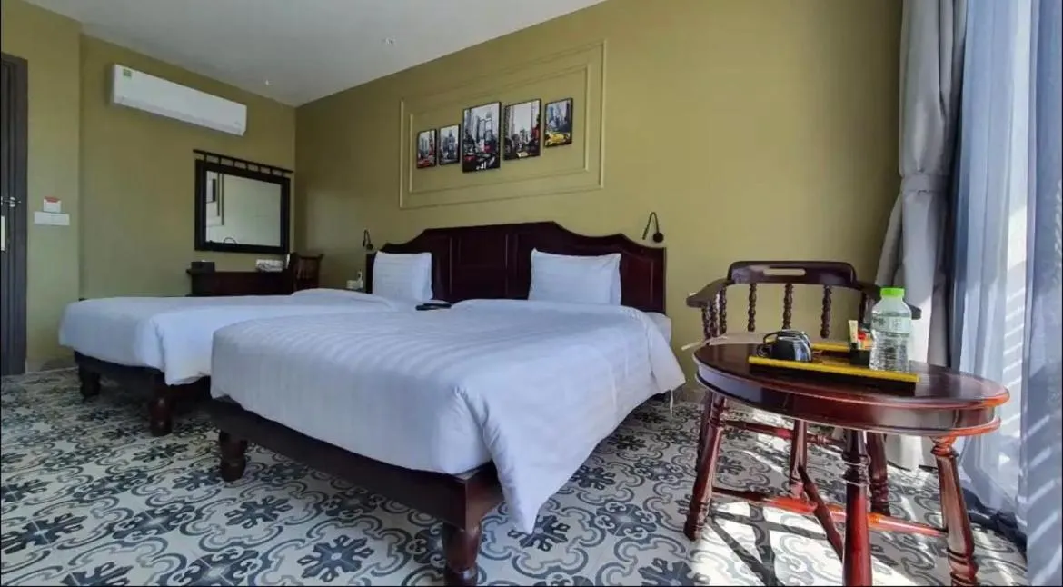 Bed in The Palmy Phu Quoc Resort & Spa