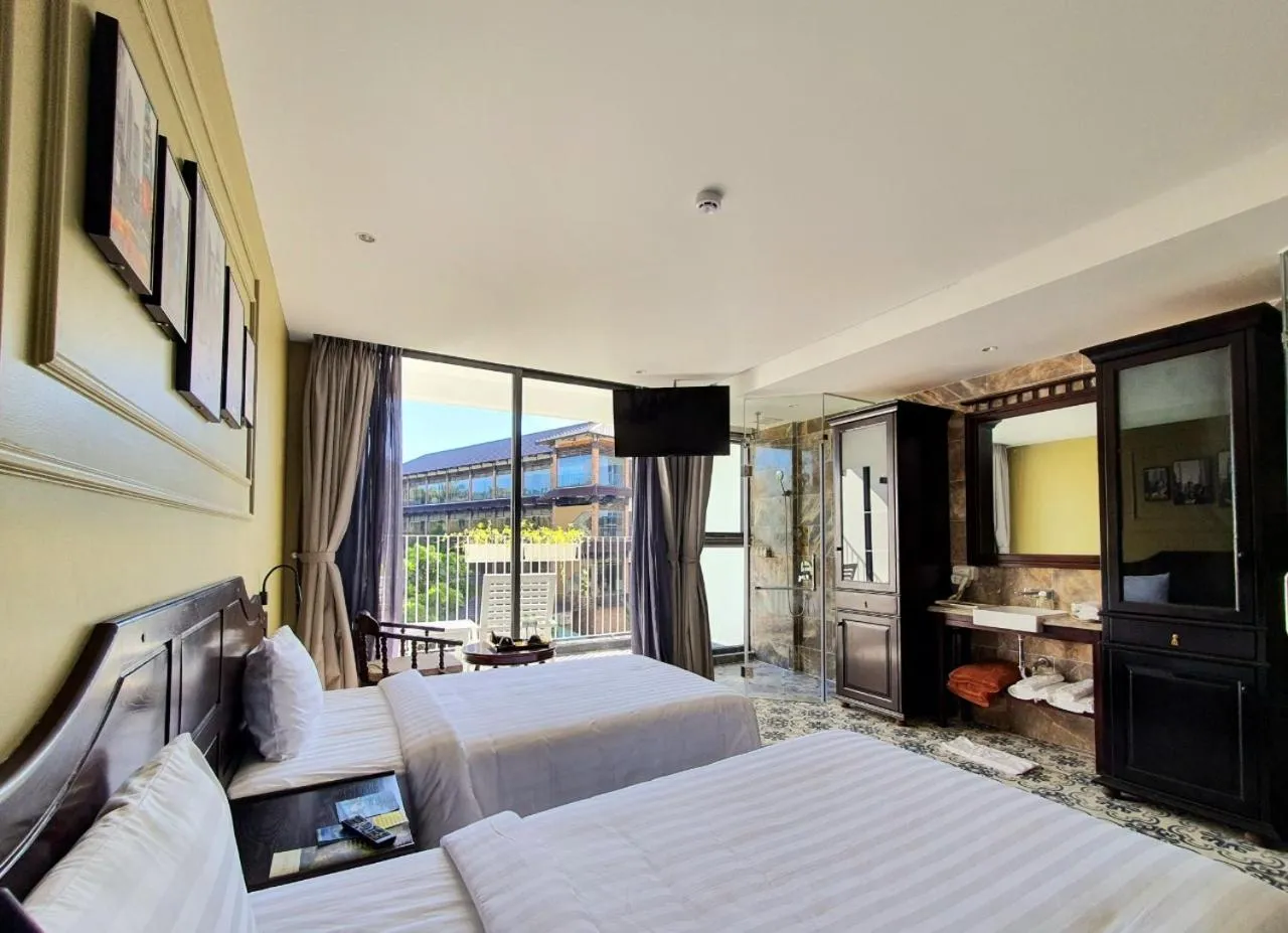 Bed in The Palmy Phu Quoc Resort & Spa