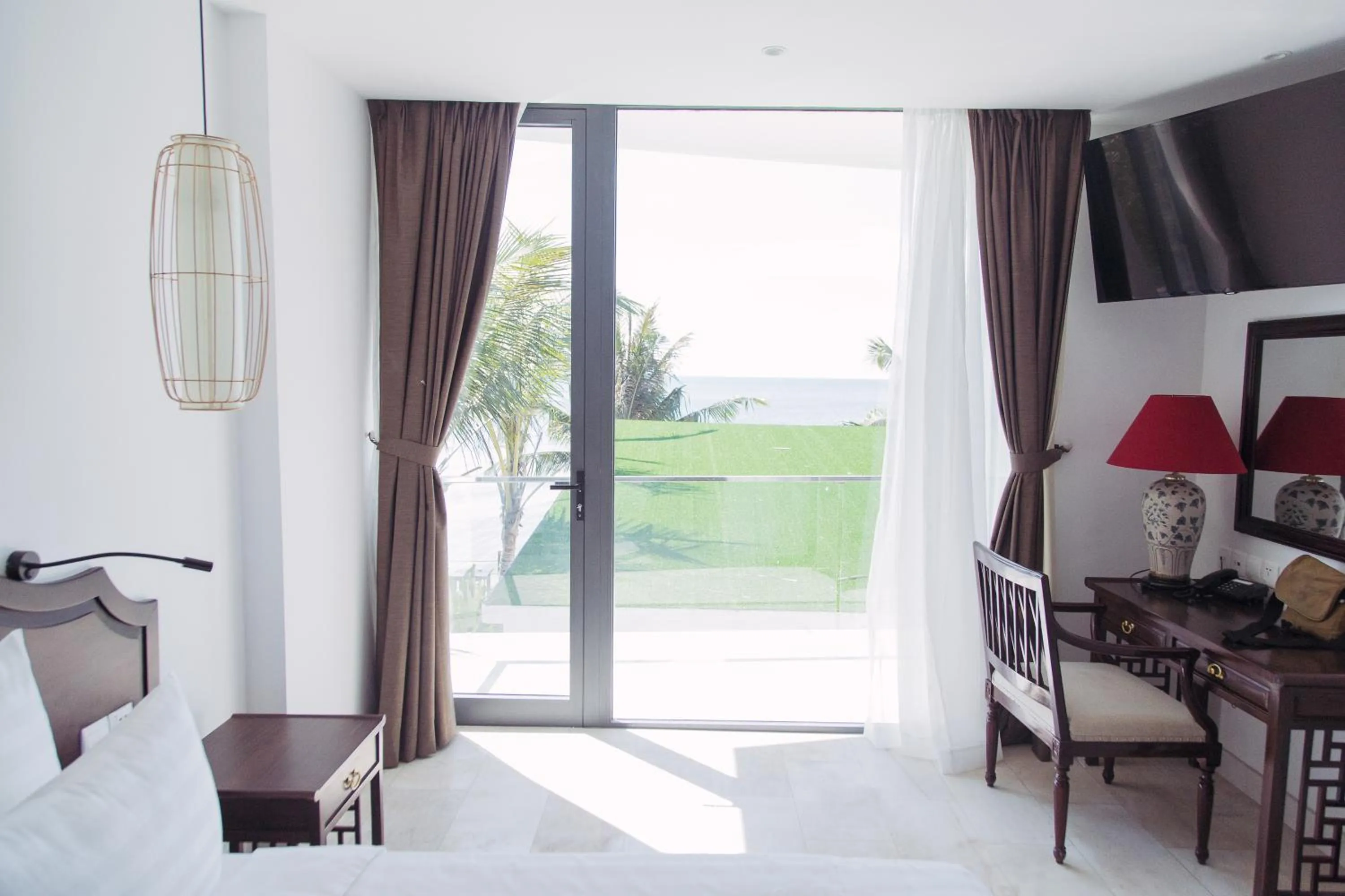 Bed in The Palmy Phu Quoc Resort & Spa