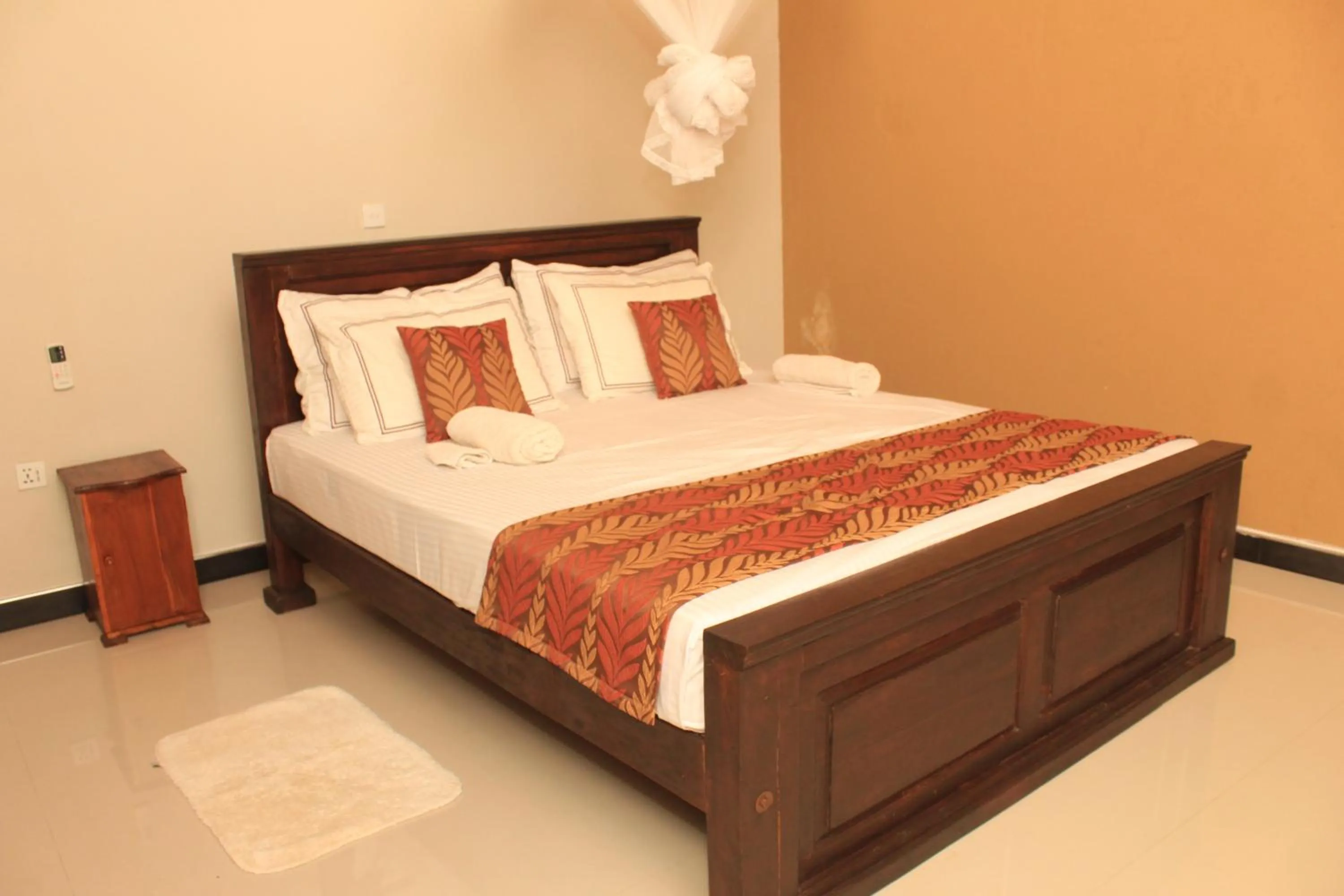Bed in Serenity Sigiri Resort