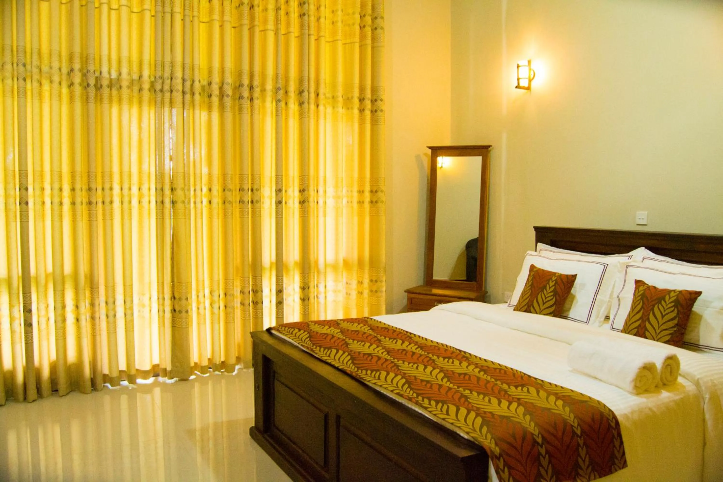 Bed in Serenity Sigiri Resort