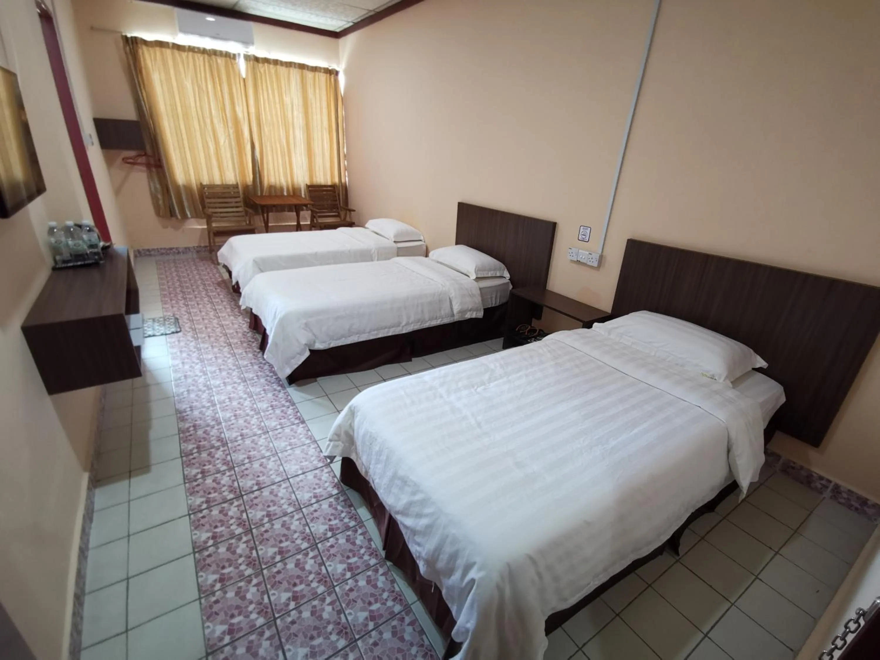 Bed in Indah Inn