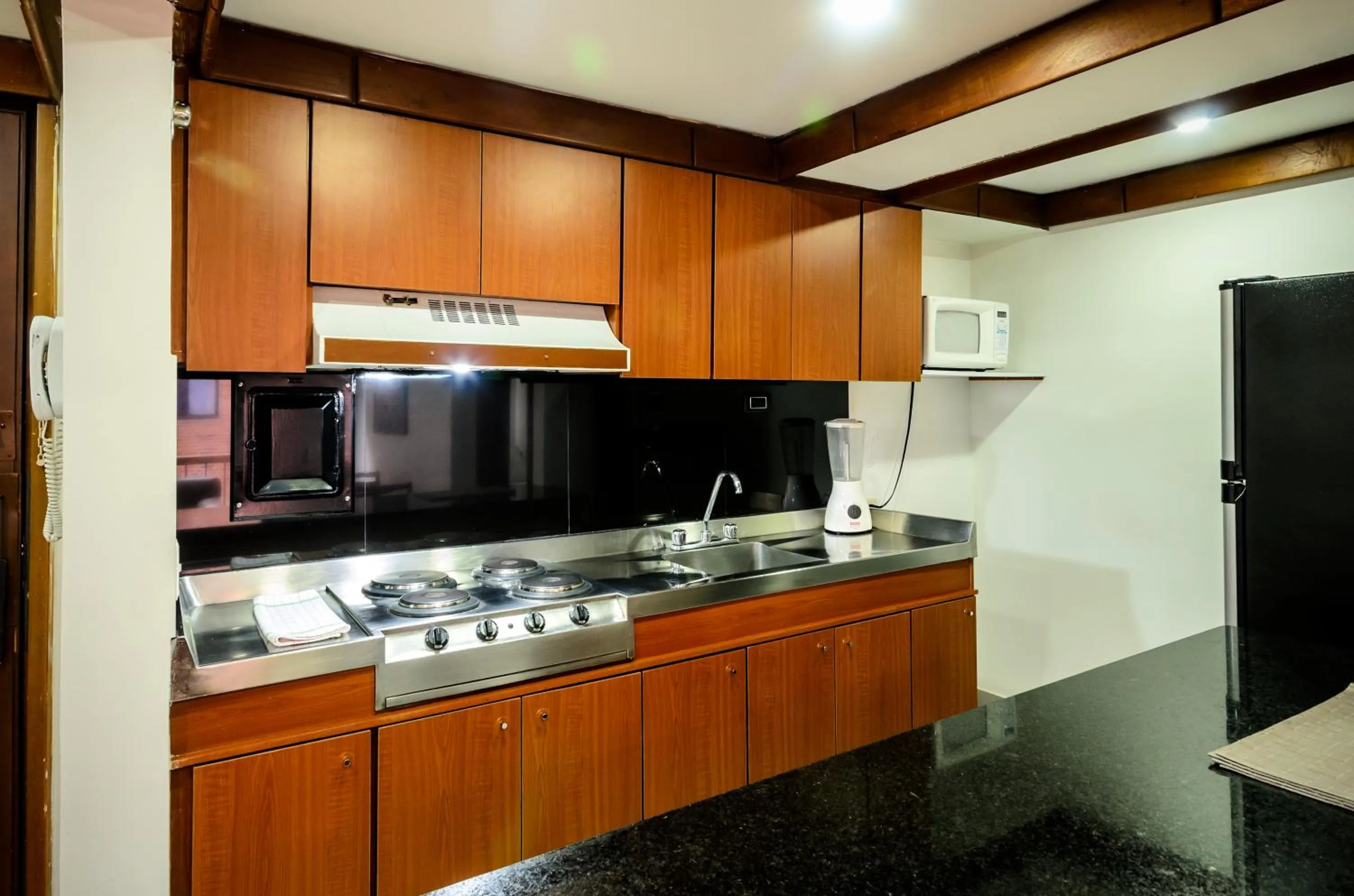 Kitchen or kitchenette in Travelers Condominio Plenitud