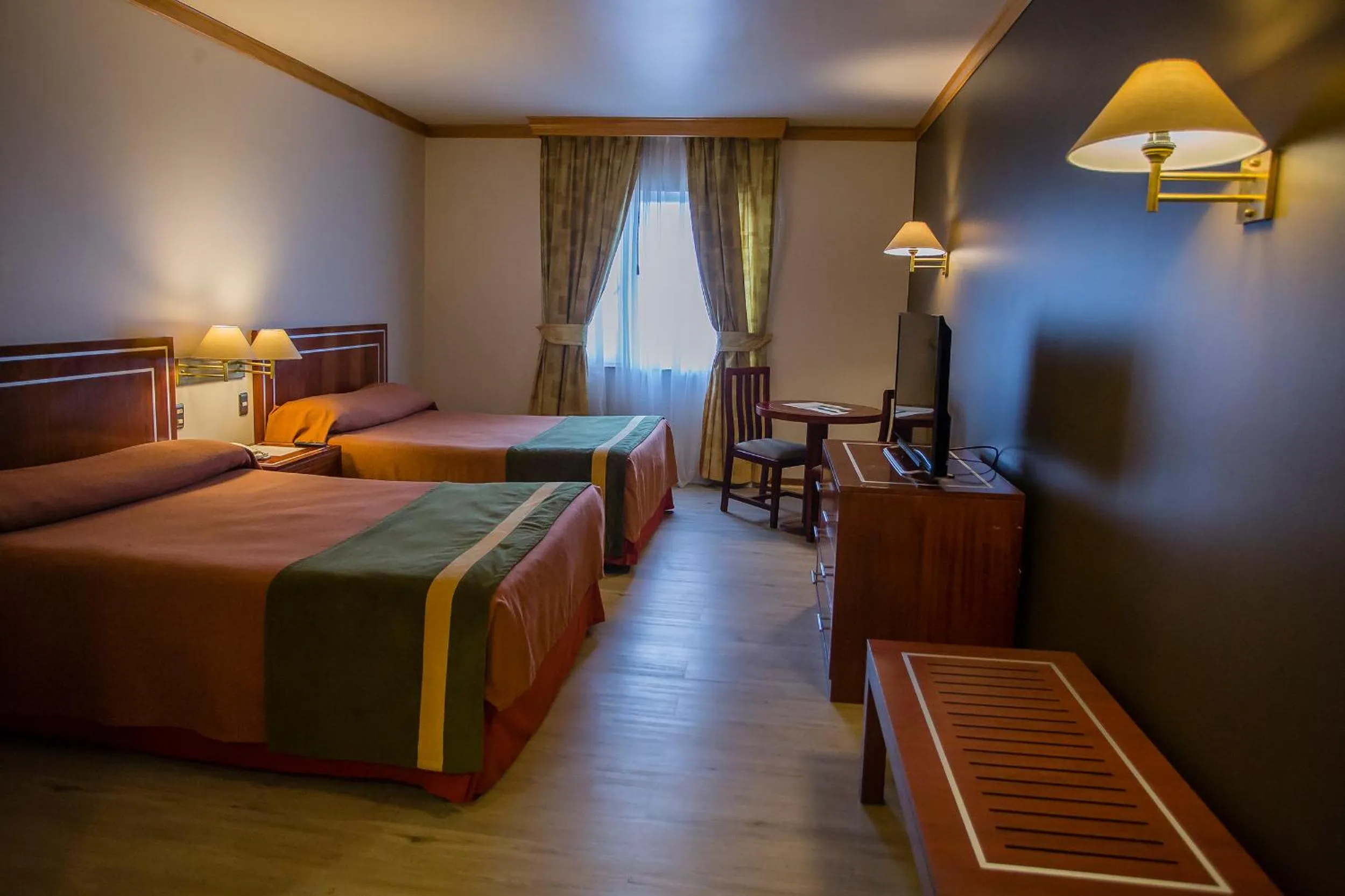 Photo of the whole room, Bed in Hotel Diego de Almagro Puerto Montt