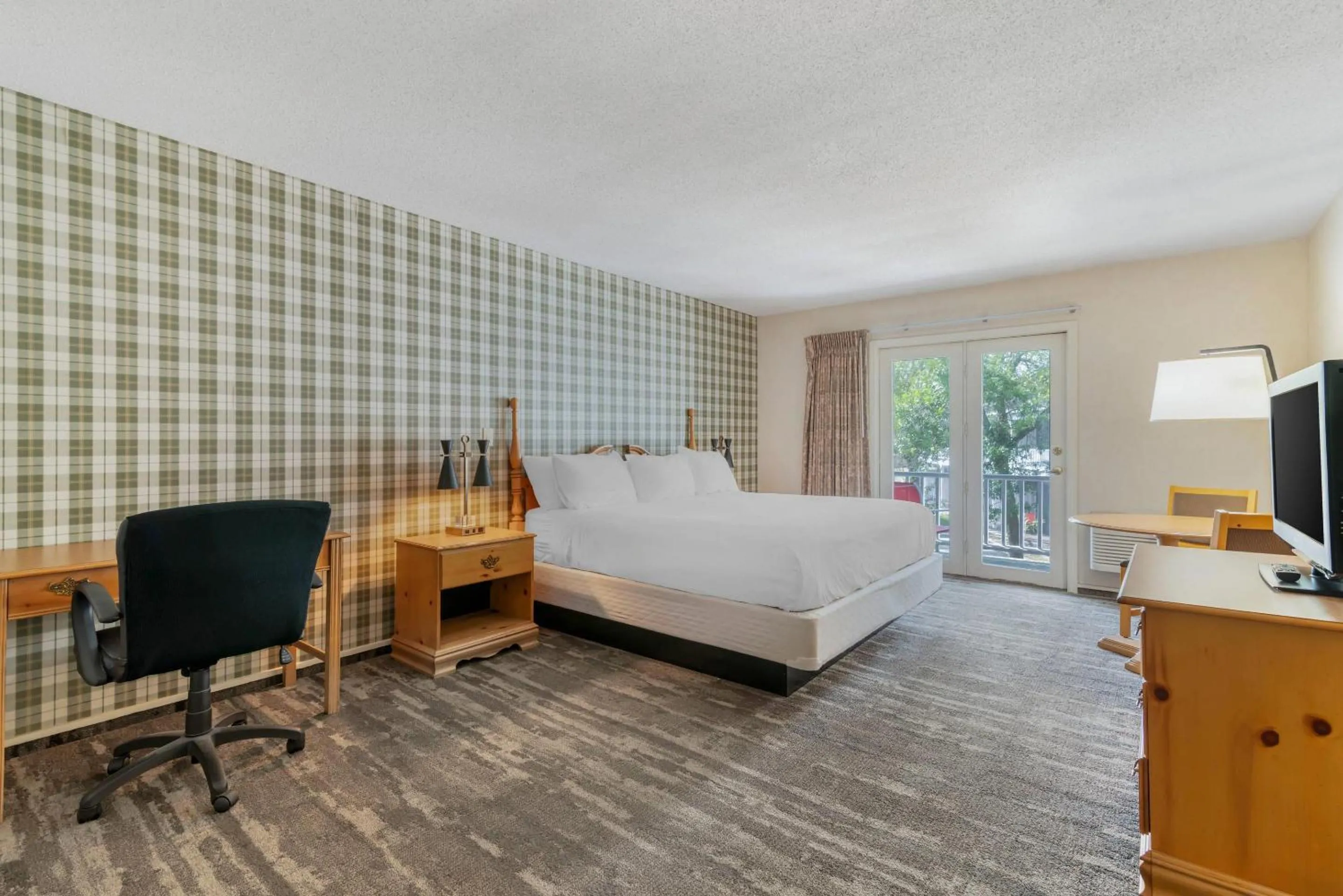 Bedroom, Bed in Green Granite Inn, an Ascend Collection Hotel