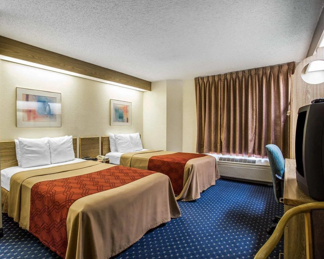 Bedroom, Bed in Econo Lodge Denver International Airport