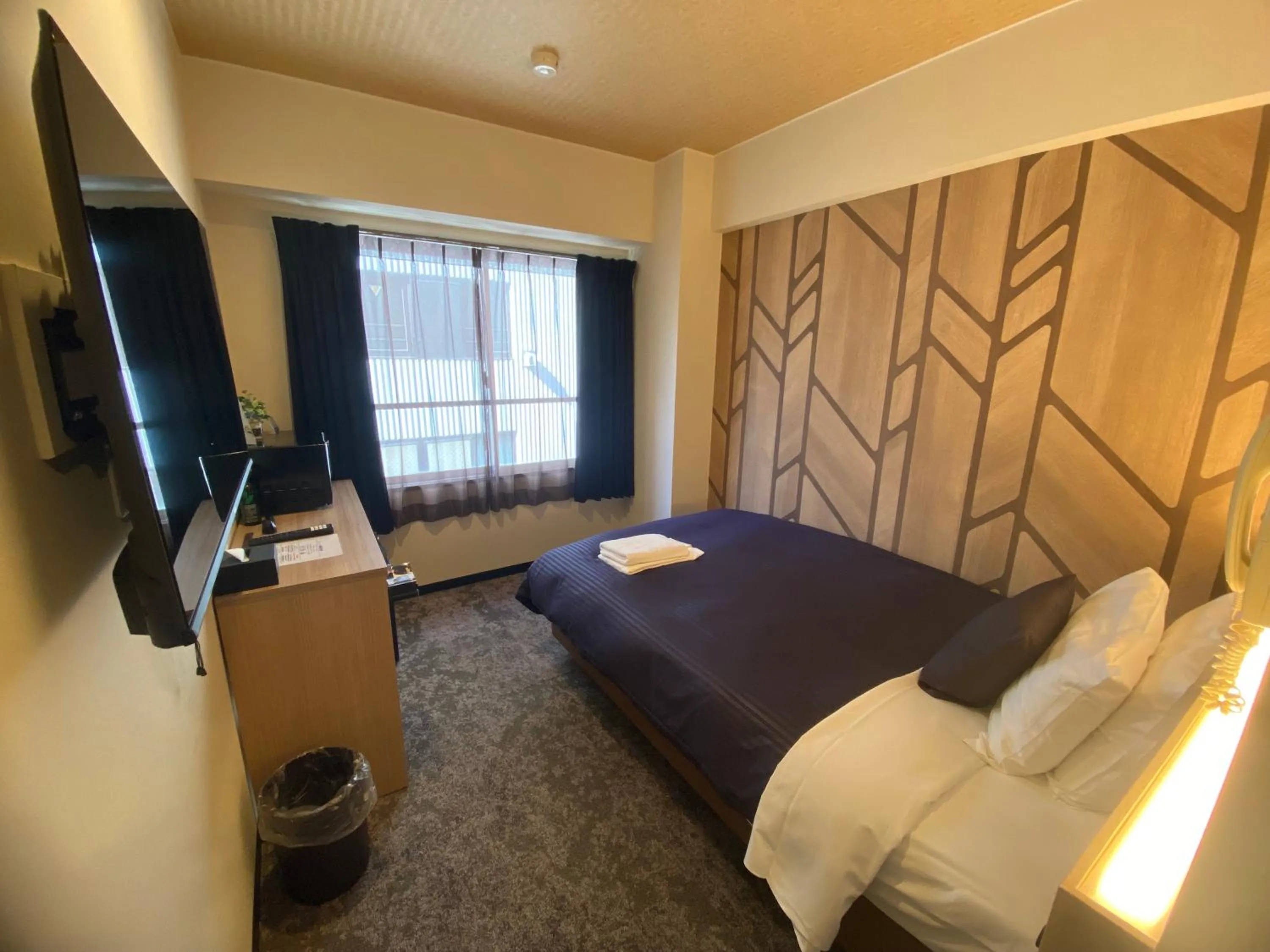Bed in HOTEL LiVEMAX BUDGET Higashi Ueno