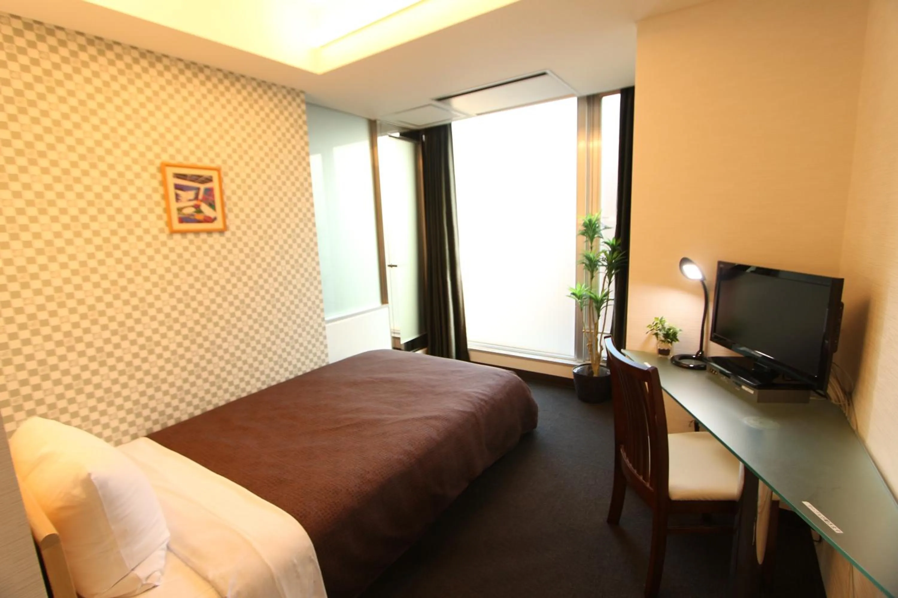 Photo of the whole room, Bed in HOTEL LiVEMAX BUDGET Korakuen