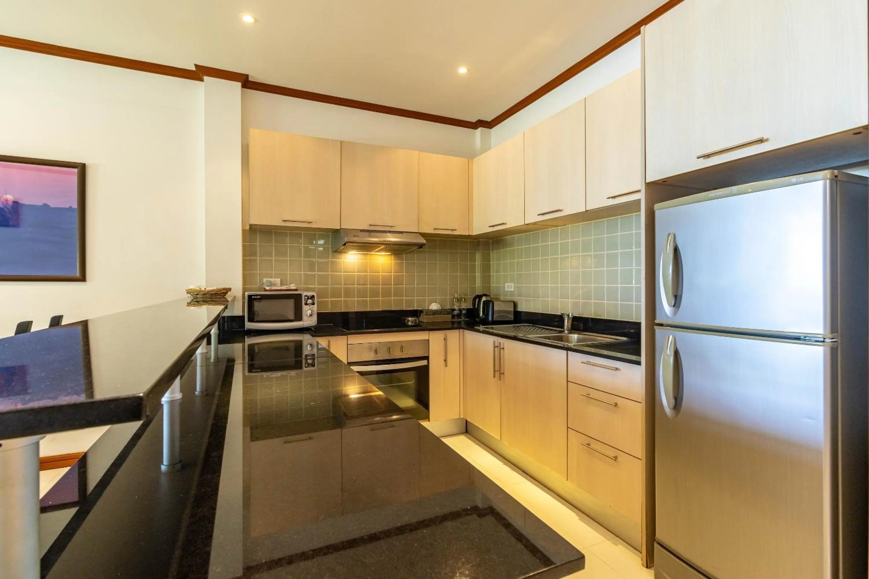 kitchen in Kamala Beach Estate Resort - SHA Extra Plus