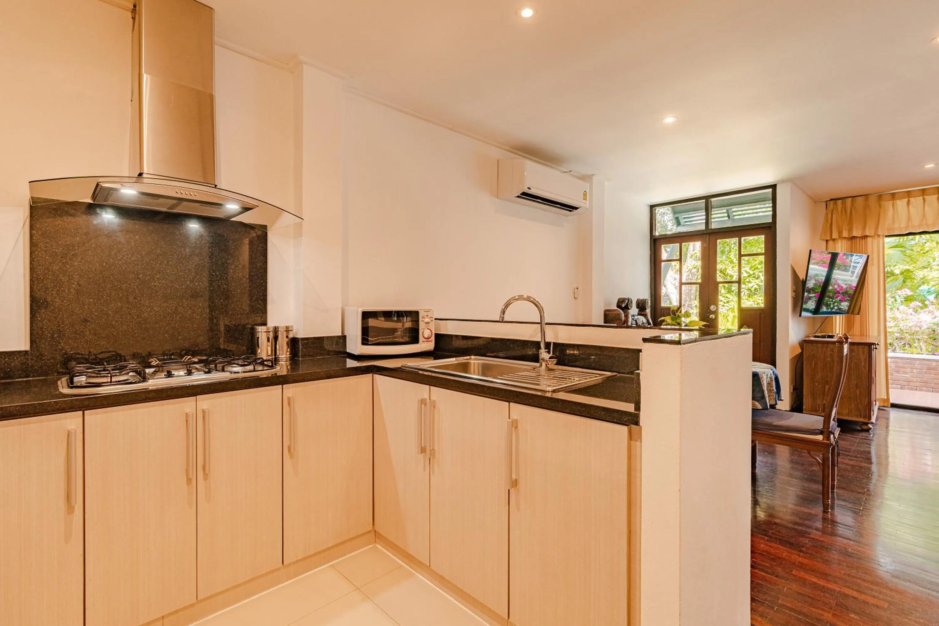Kitchen or kitchenette in Kamala Beach Estate Resort - SHA Extra Plus