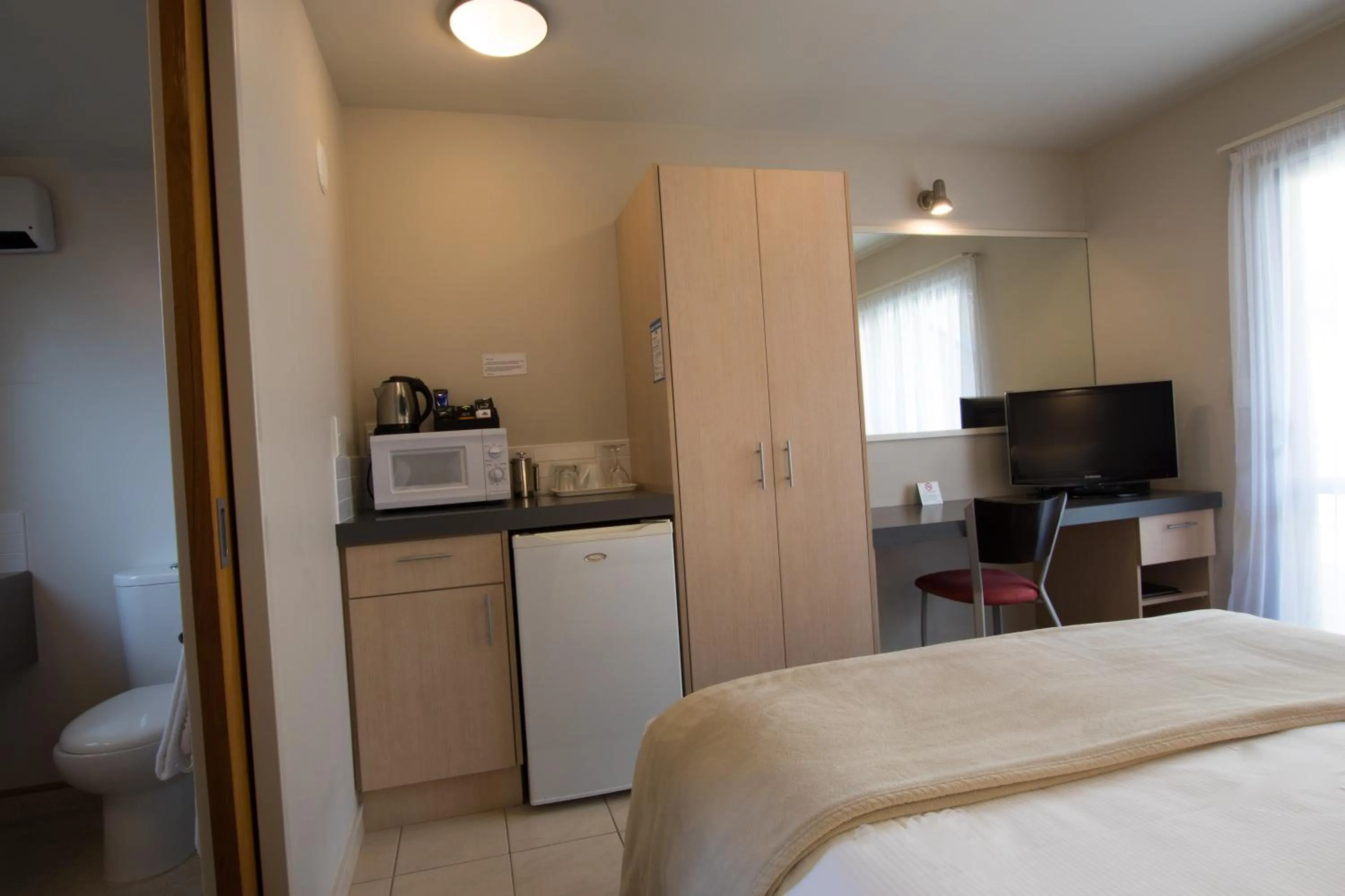 Bed in Bella Vista Motel Kaikoura