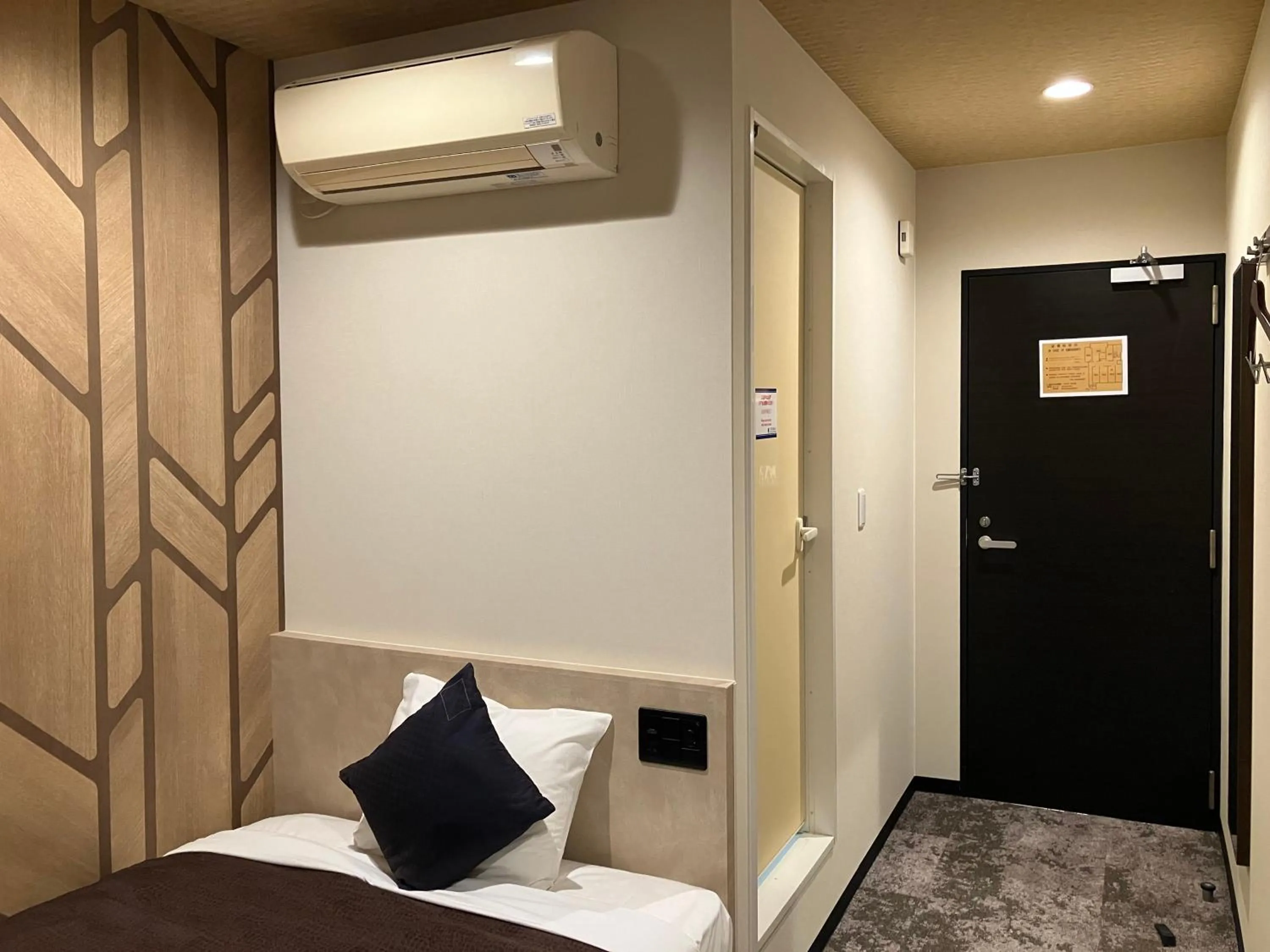 Bed in HOTEL LiVEMAX BUDGET Amagasaki