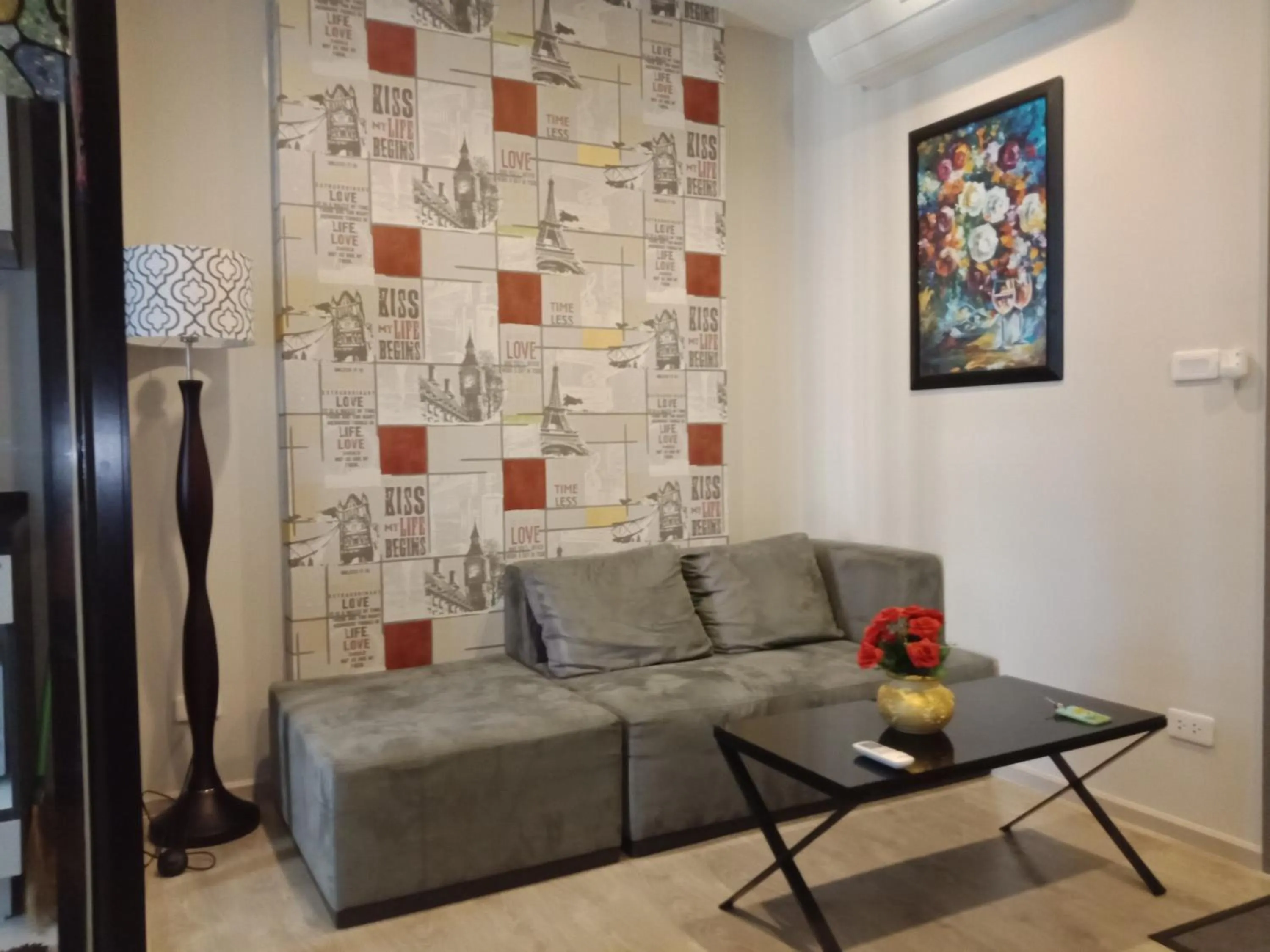 Living room in LLX Apartments at The Base condo