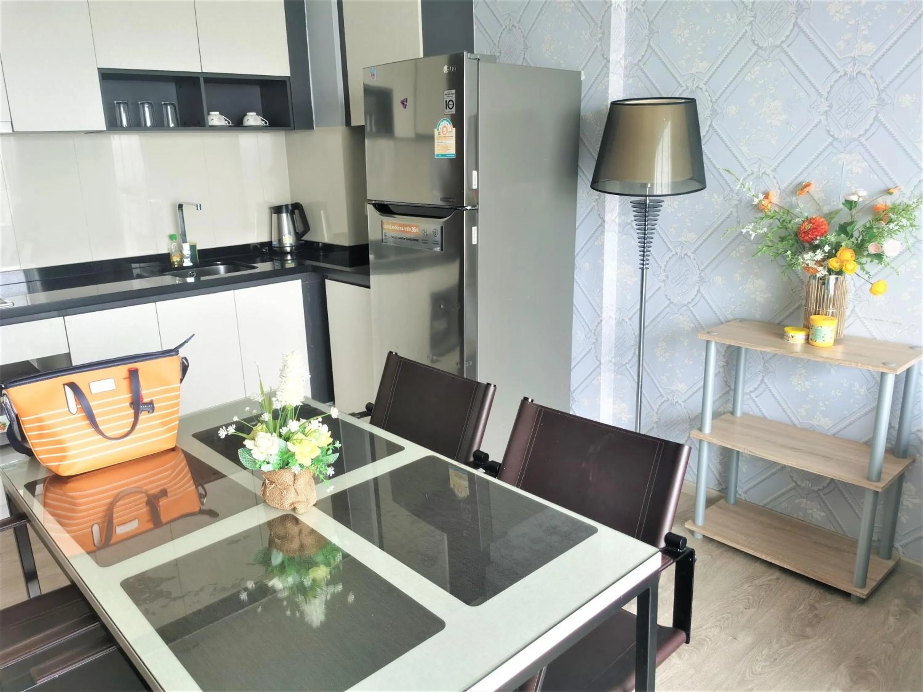 Dining area in LLX Apartments at The Base condo