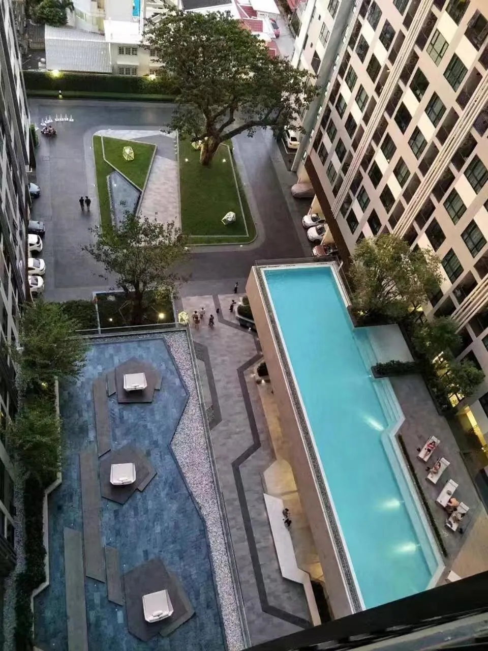 Pool view in LLX Apartments at The Base condo