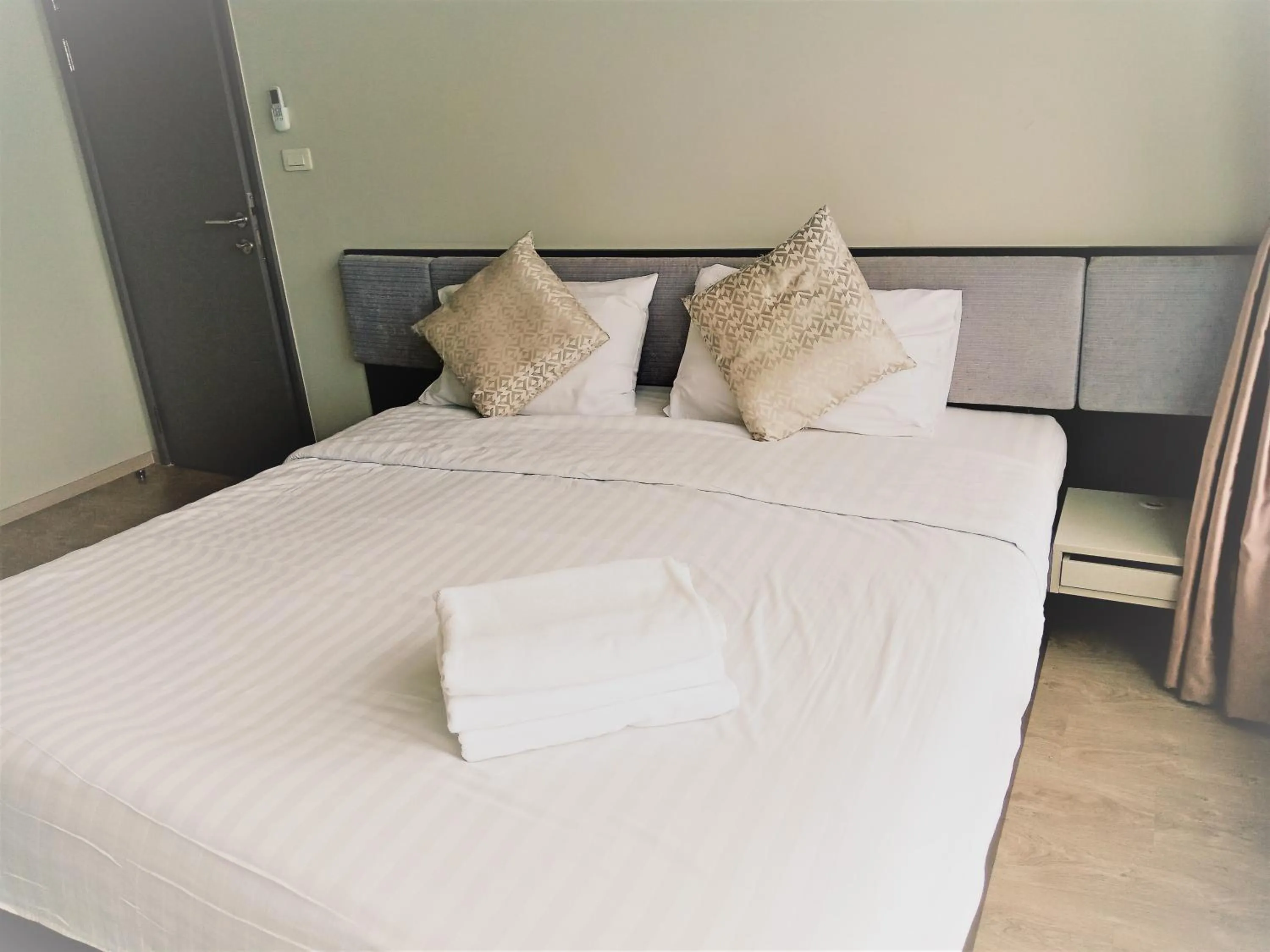 Bed in LLX Apartments at The Base condo