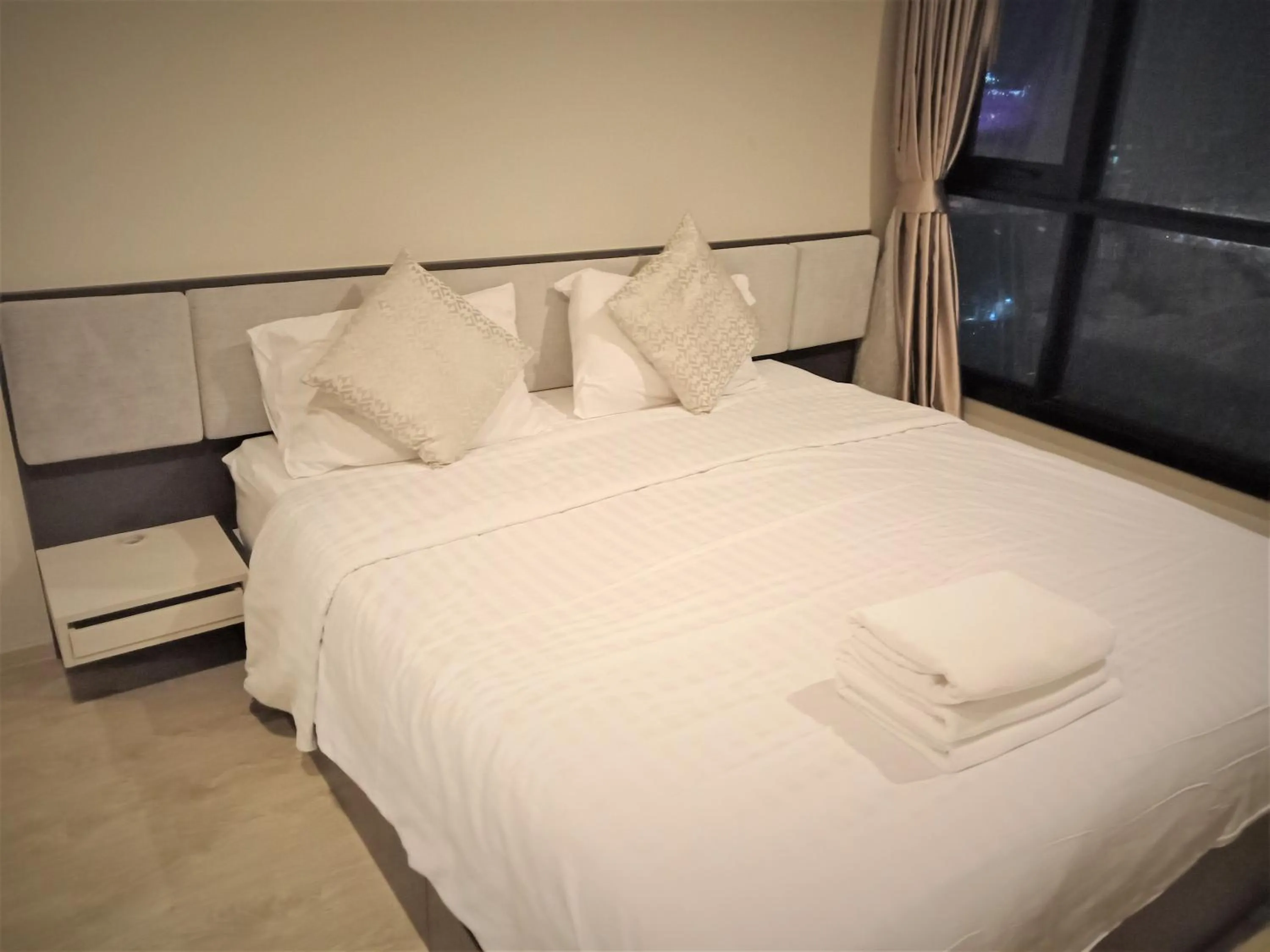 Bedroom, Bed in LLX Apartments at The Base condo