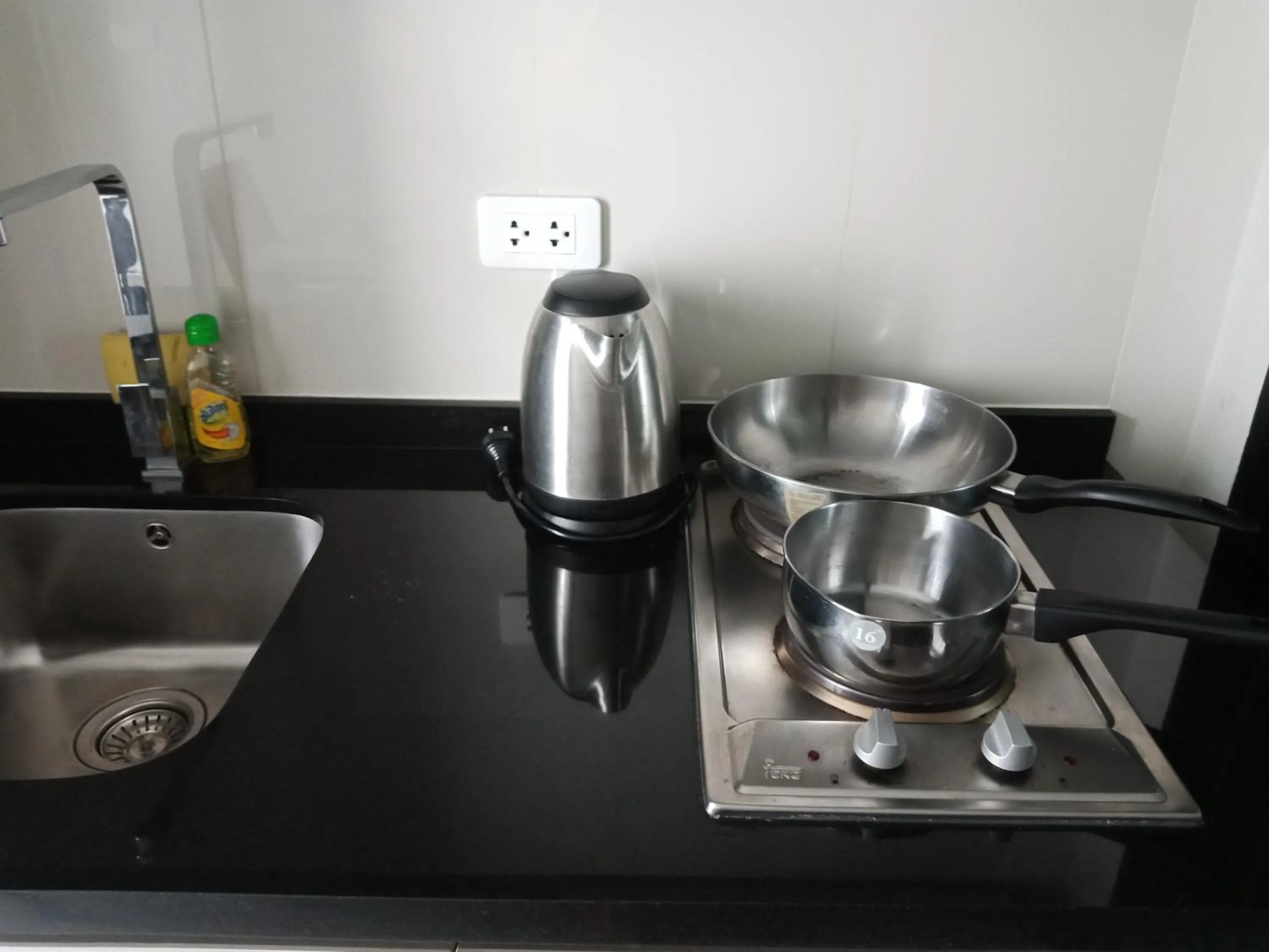 Kitchen or kitchenette in LLX Apartments at The Base condo