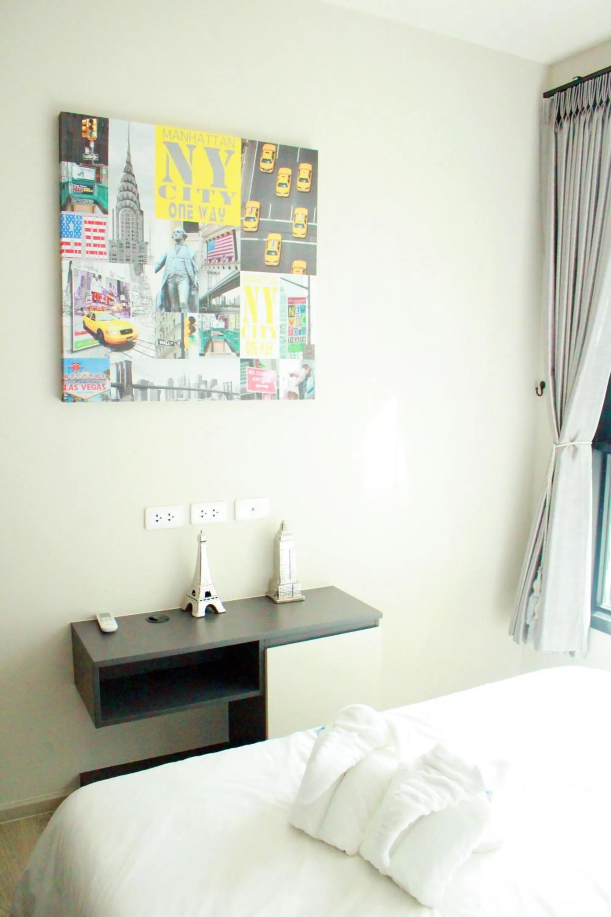 Decorative detail, Bed in LLX Apartments at The Base condo