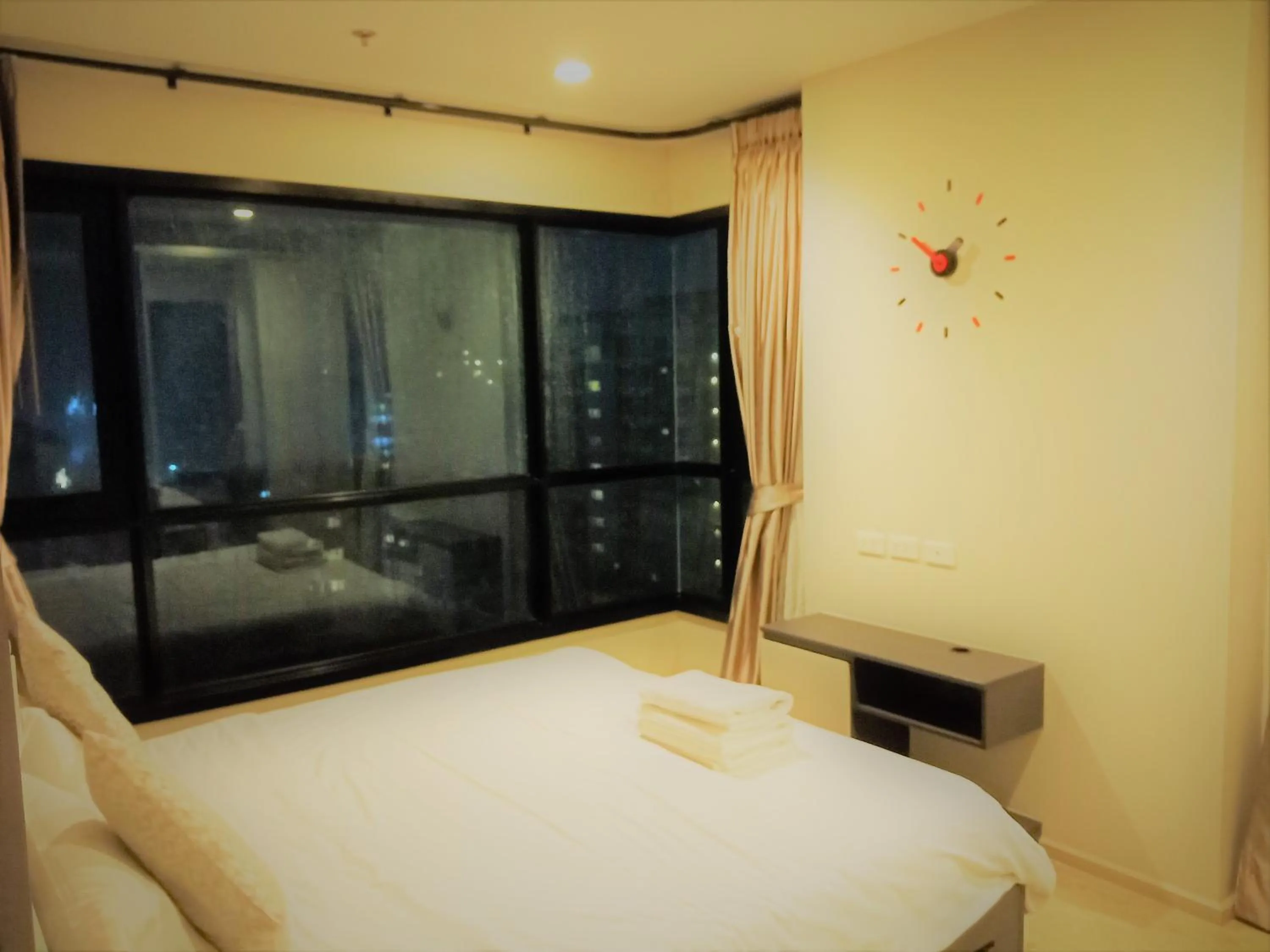 Bedroom, Bed in LLX Apartments at The Base condo