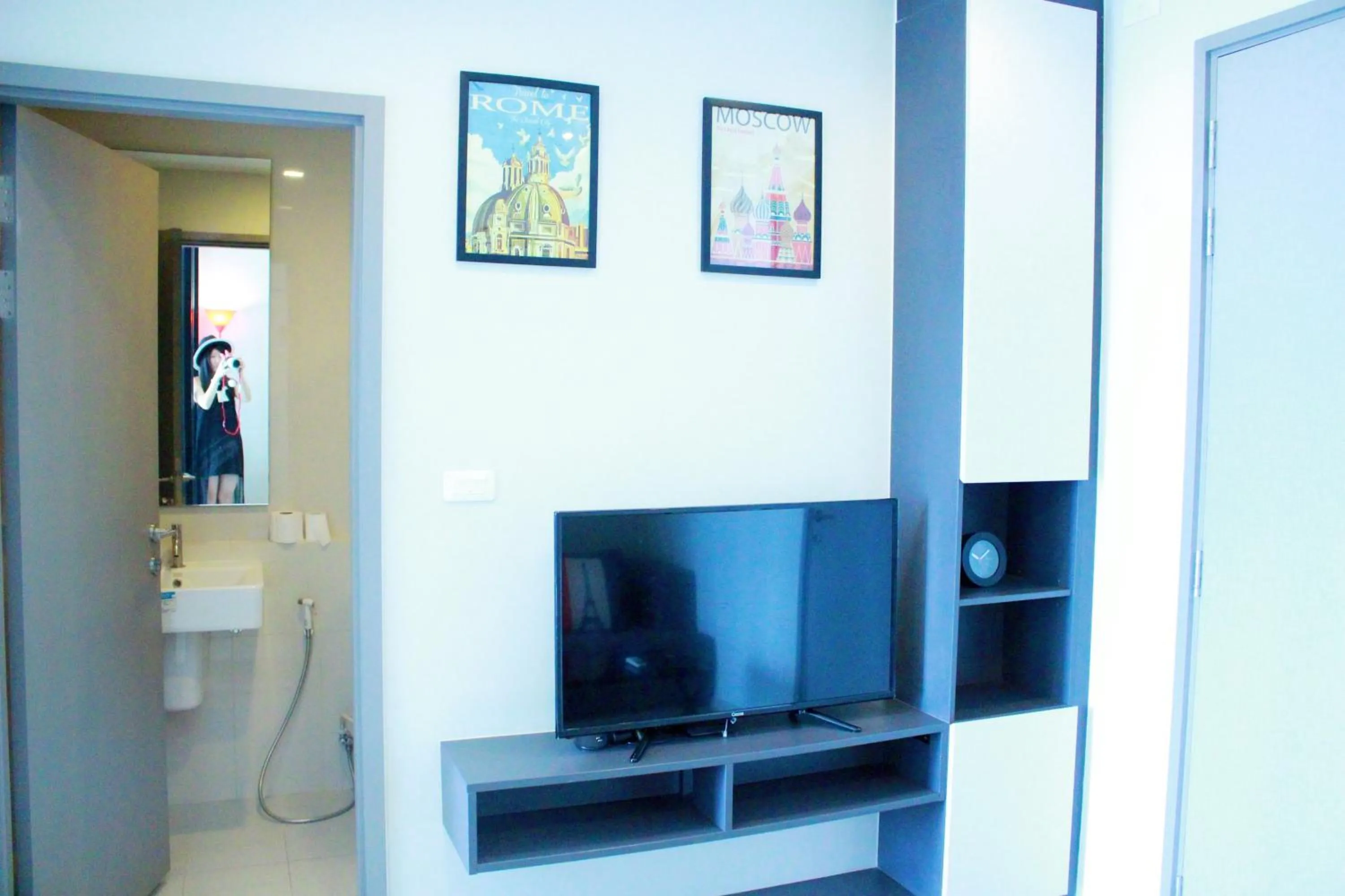 Living room in LLX Apartments at The Base condo