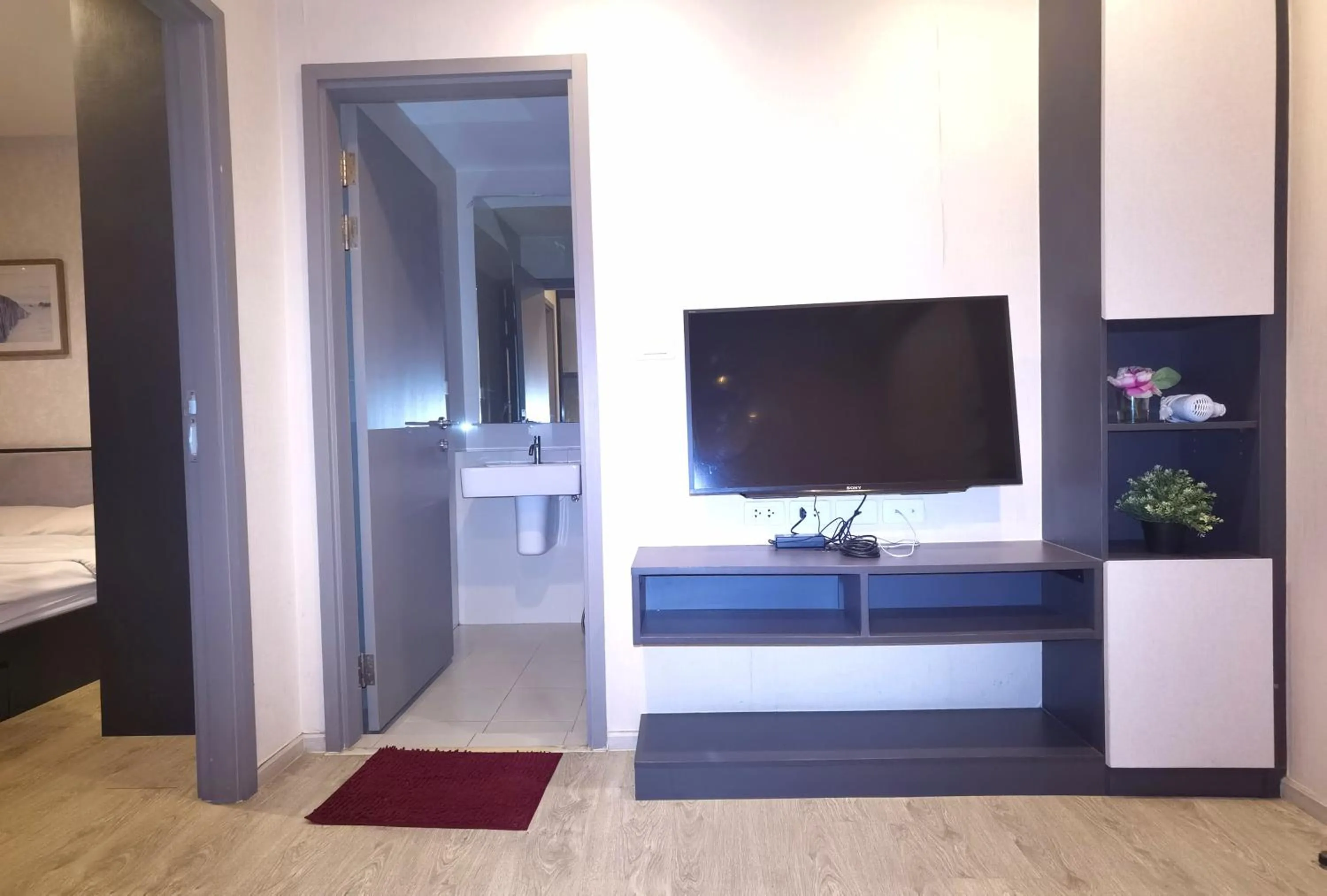 Bed in LLX Apartments at The Base condo