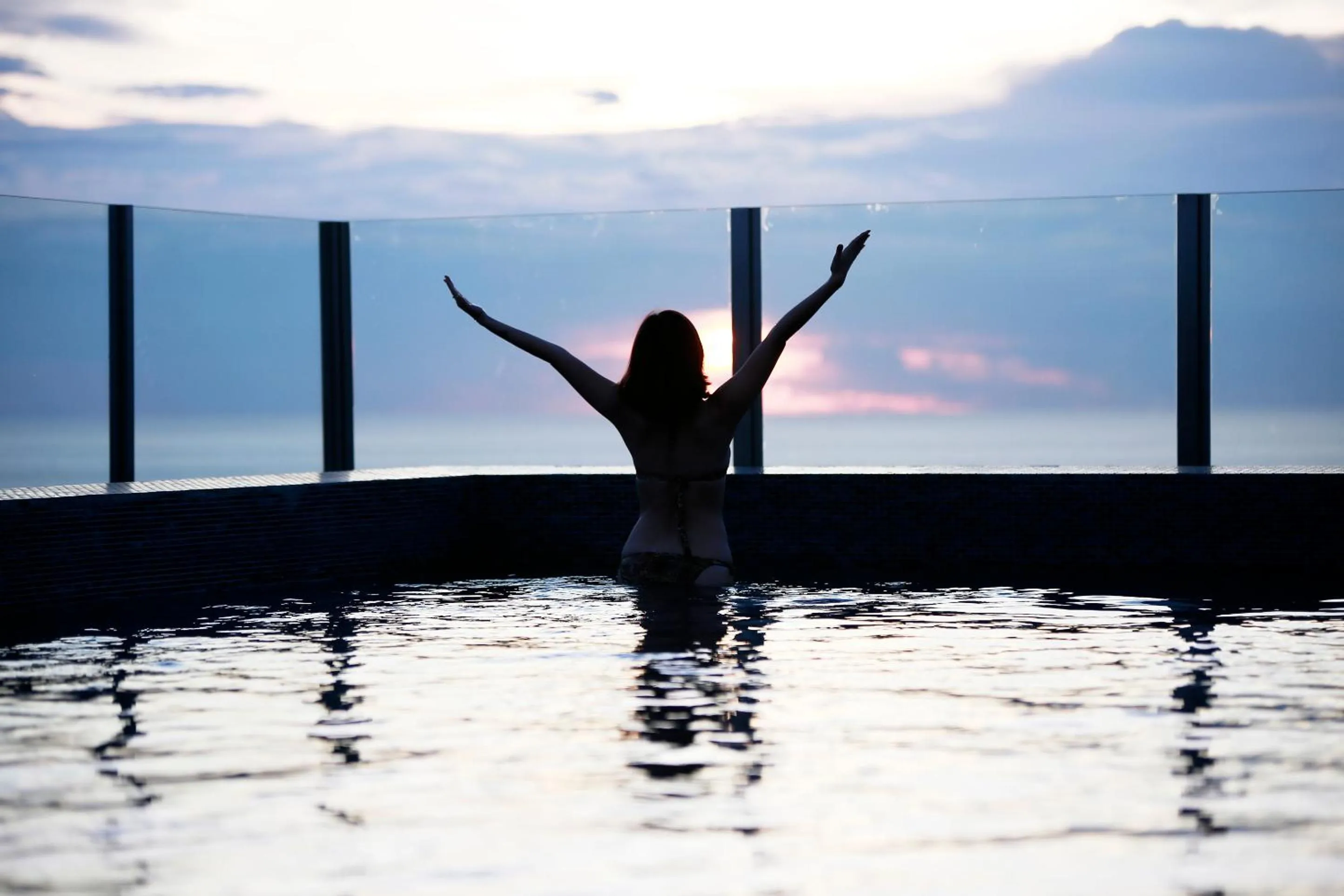 Pool view in LLX Apartments at The Base condo