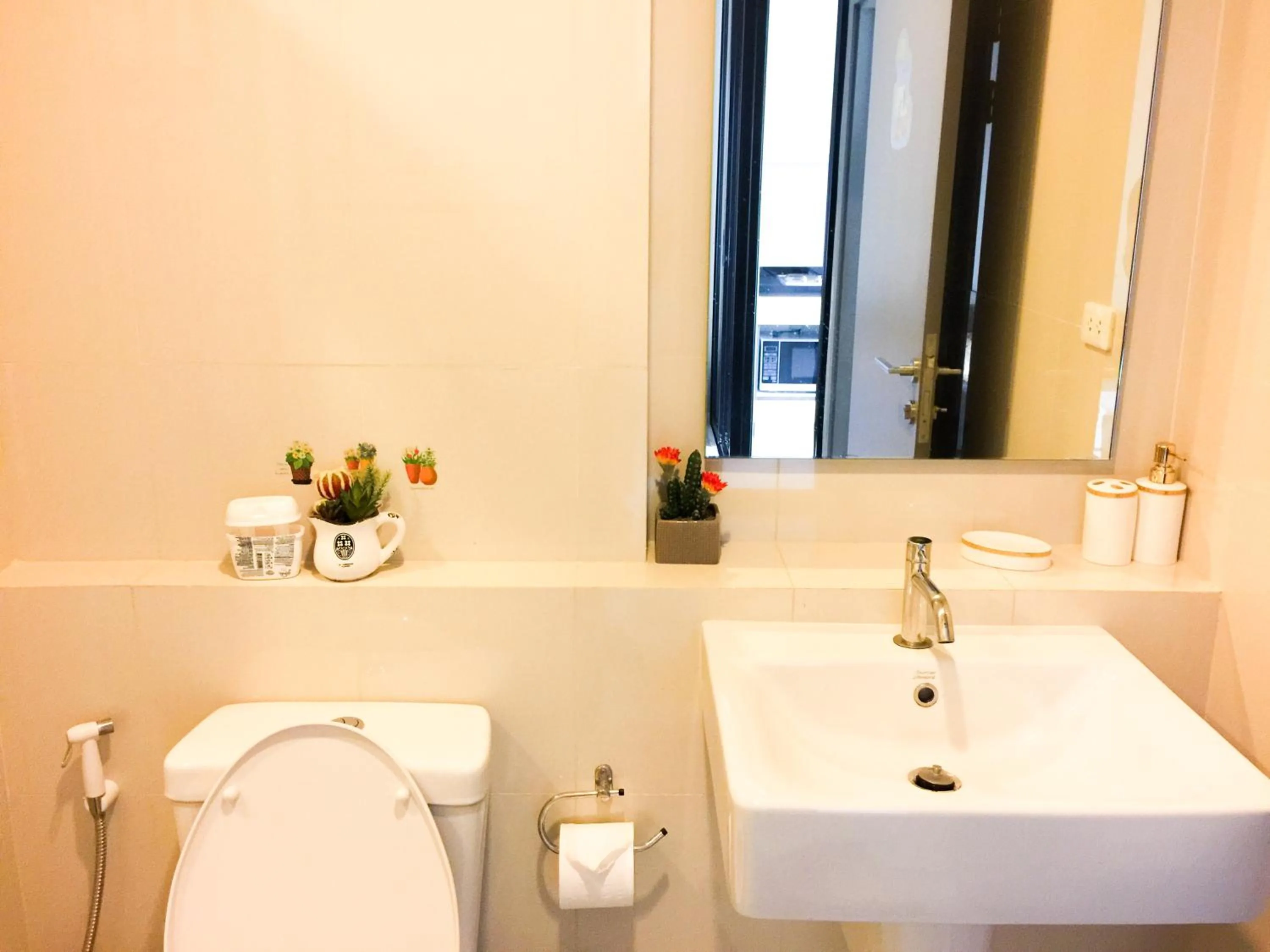 Bathroom in LLX Apartments at The Base condo