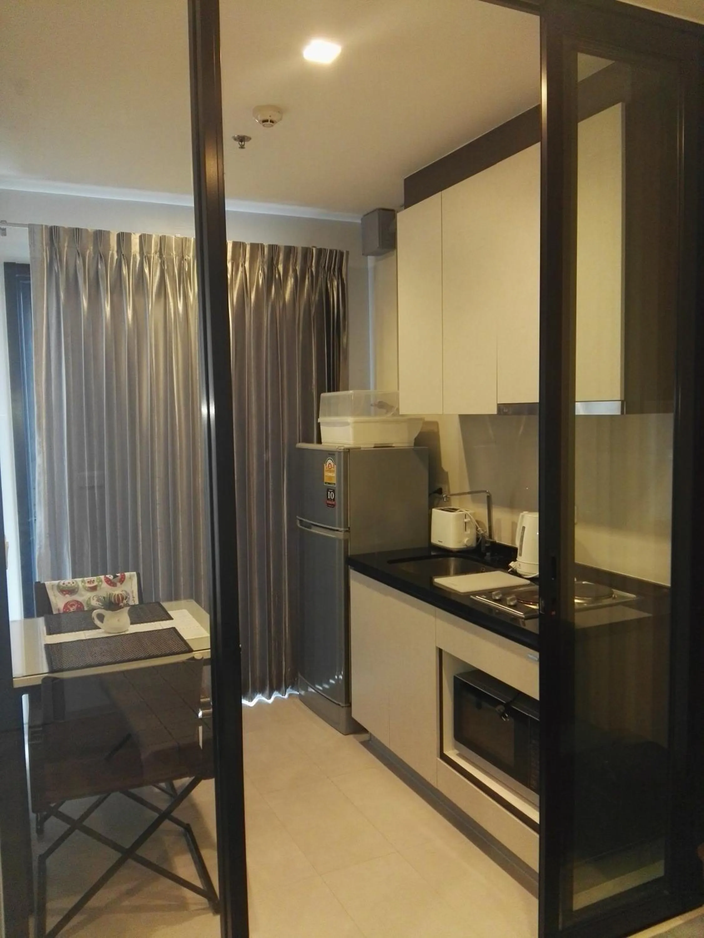 Kitchen or kitchenette in LLX Apartments at The Base condo