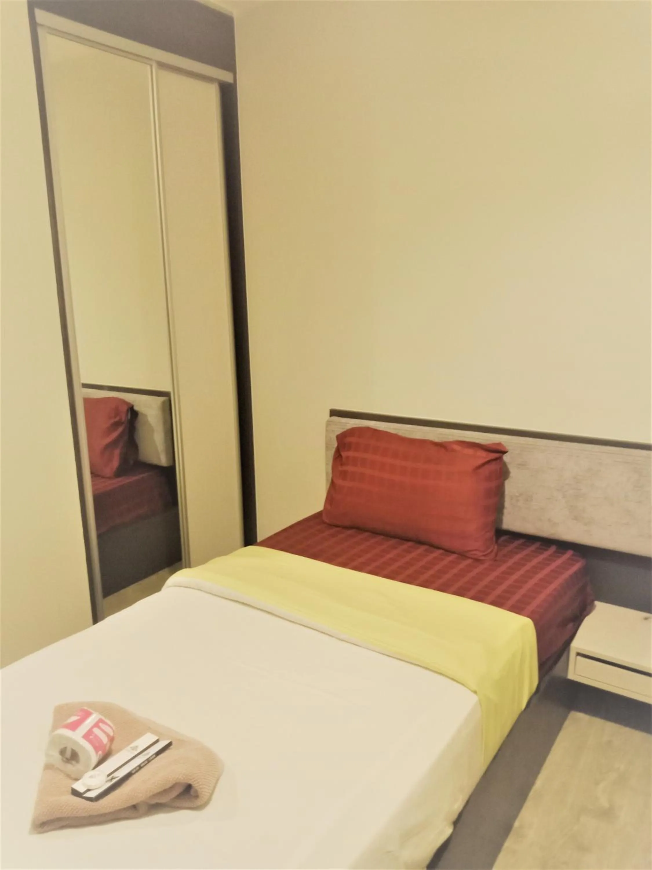 Bed in LLX Apartments at The Base condo