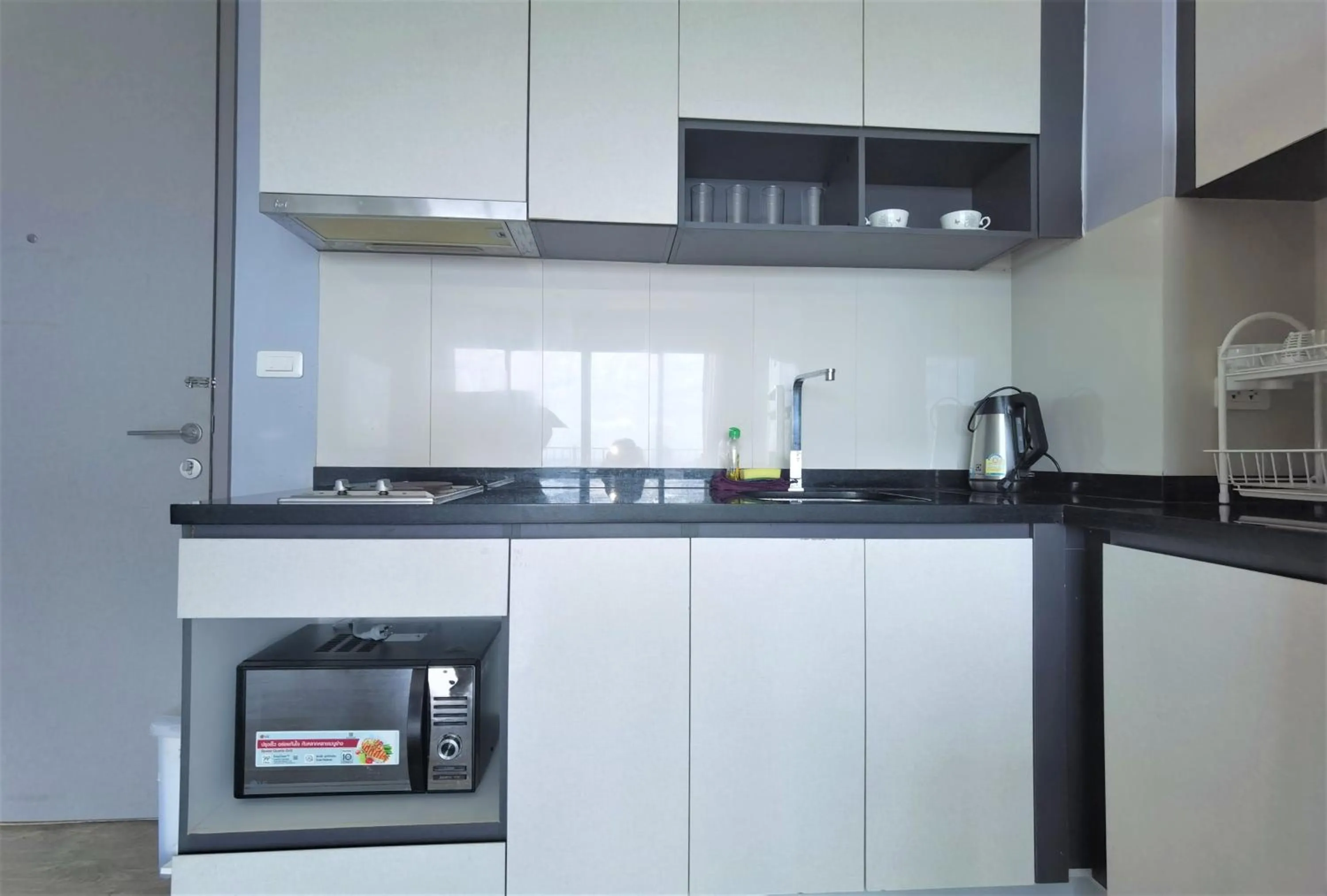 Kitchen or kitchenette in LLX Apartments at The Base condo