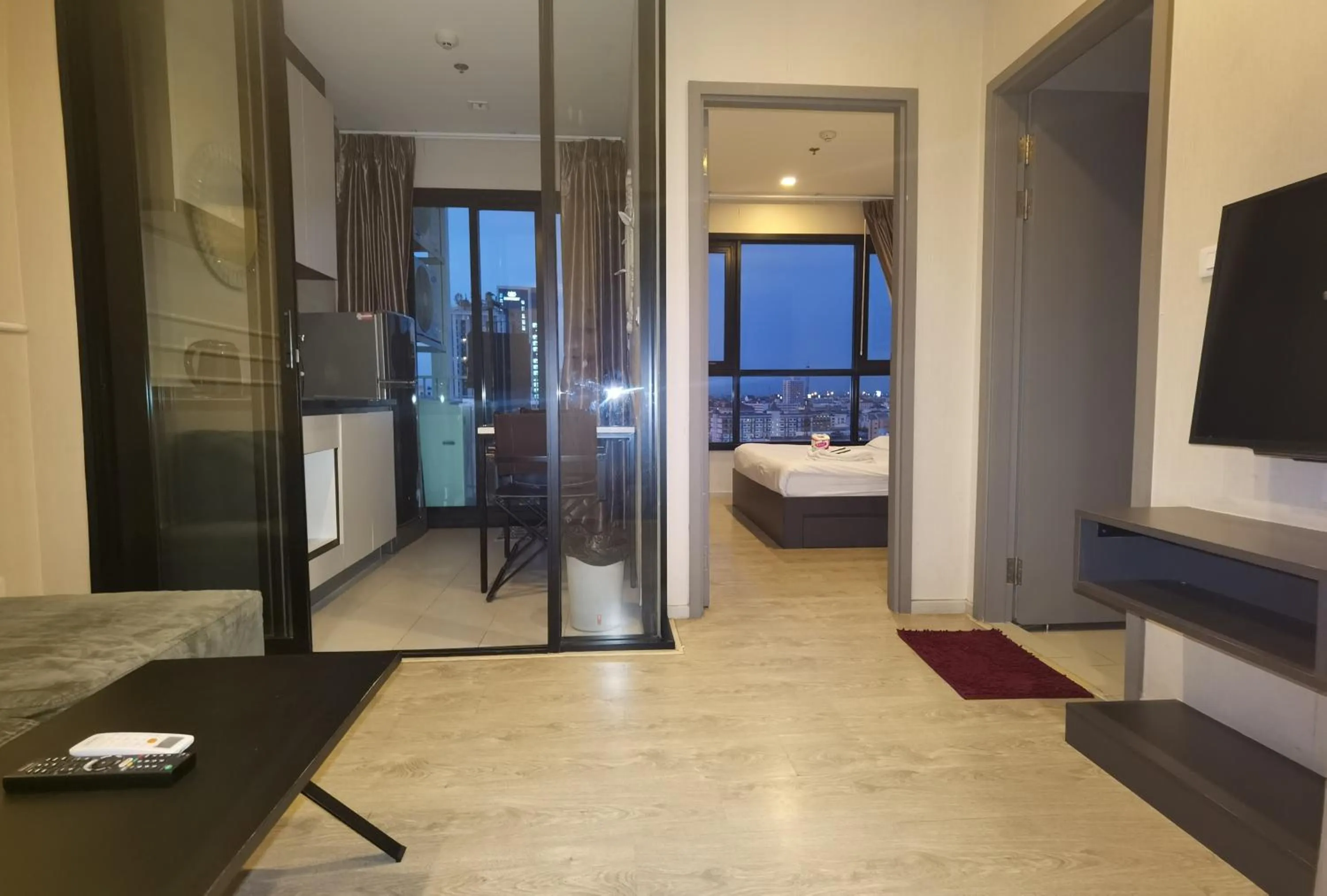 Bed in LLX Apartments at The Base condo