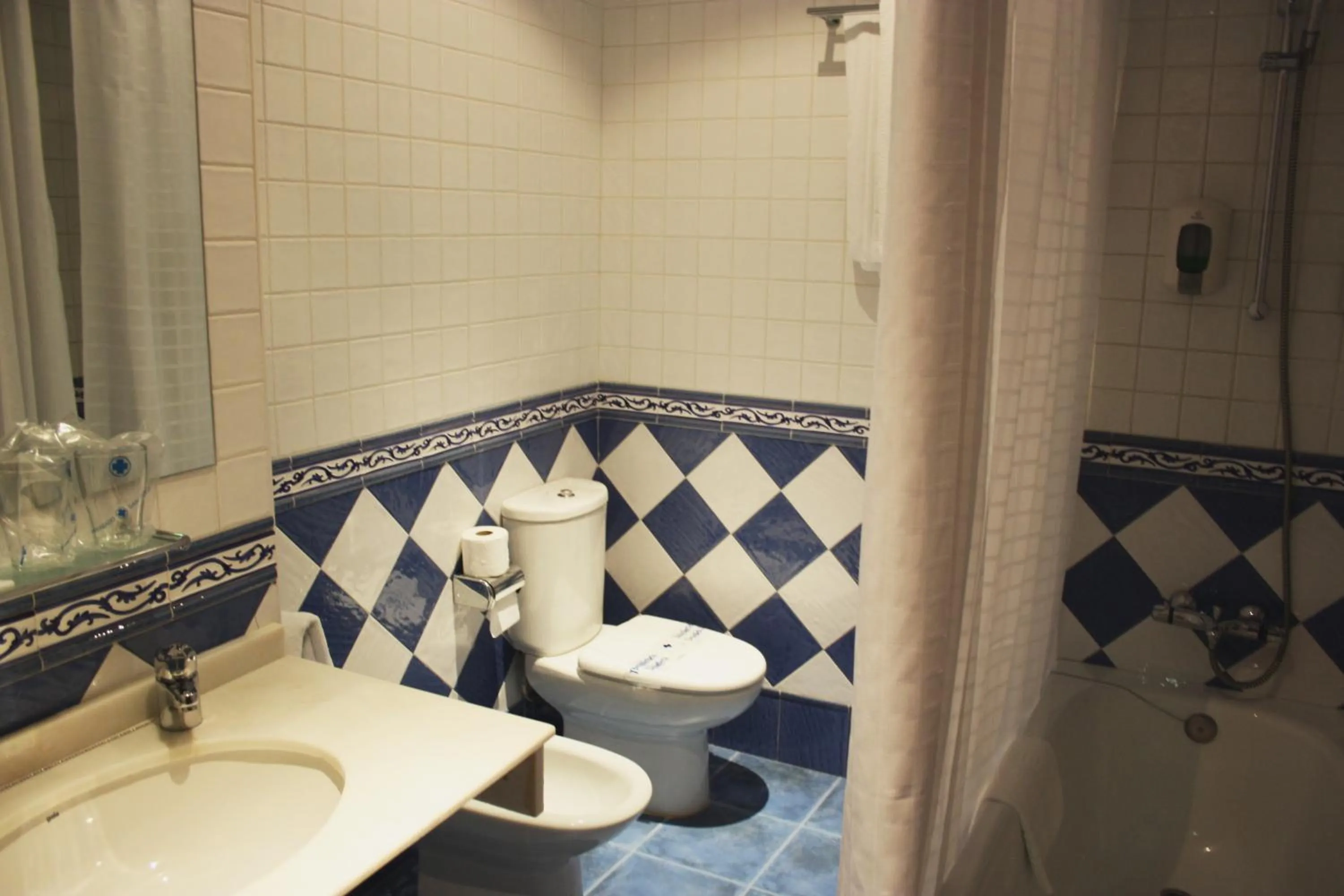 Bathroom in Hosteria Sara by gaiarooms