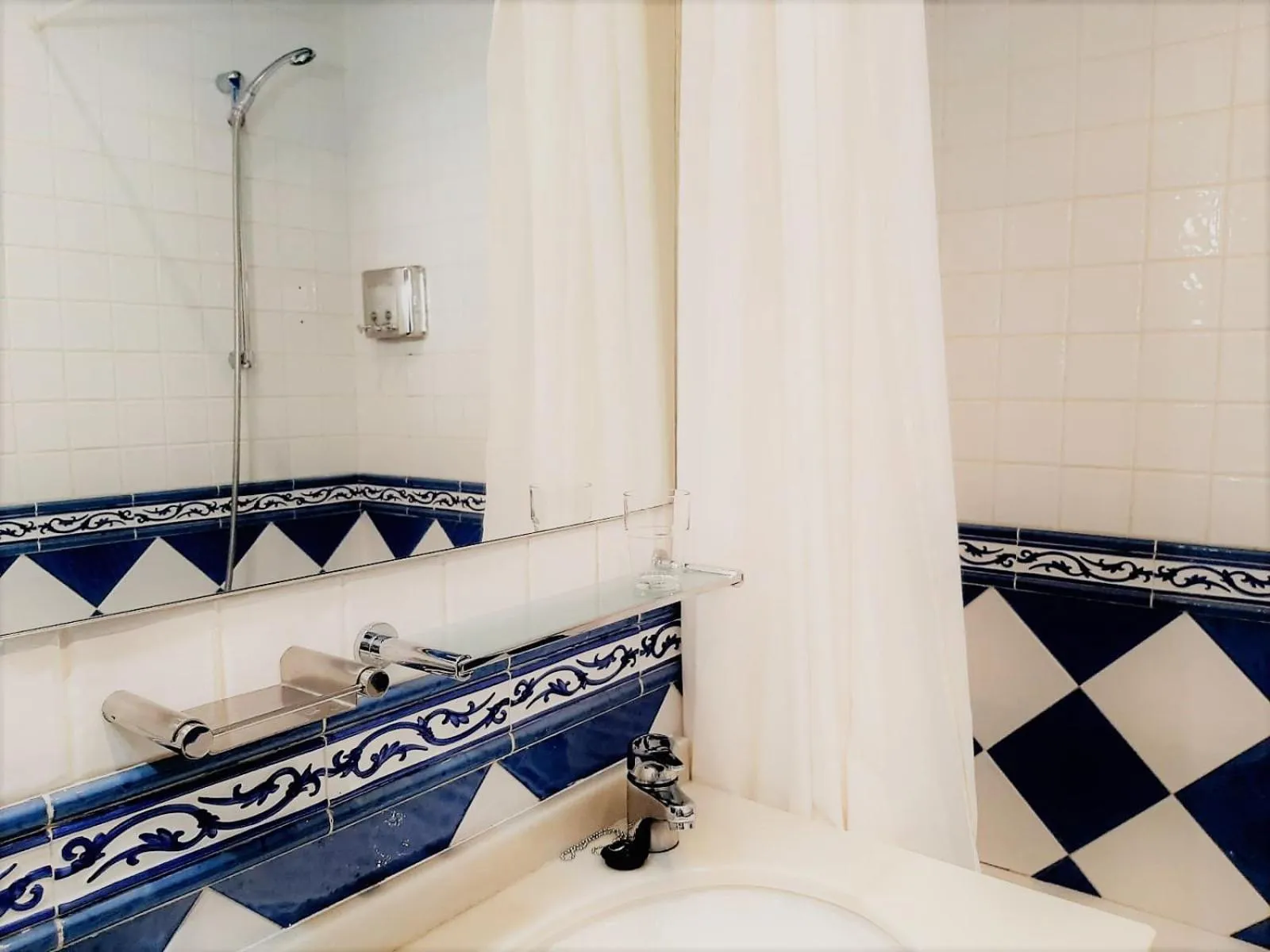 Bathroom in Hosteria Sara by gaiarooms