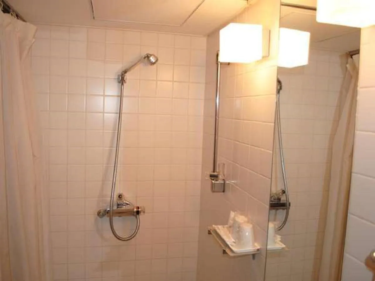 Shower in HOTEL LiVEMAX BUDGET Yumoto