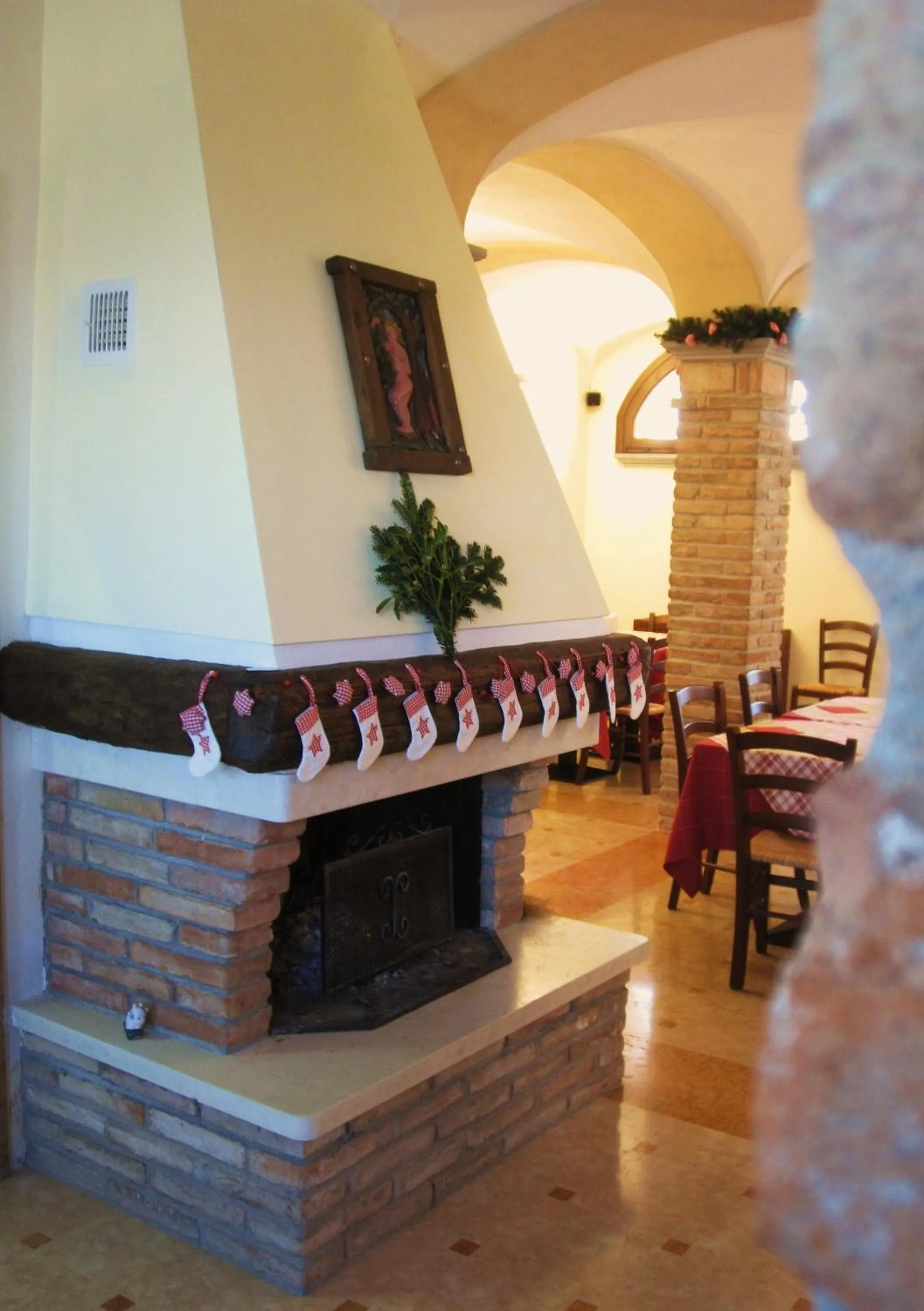 Communal lounge/ TV room in Agriturismo Cà Nuova