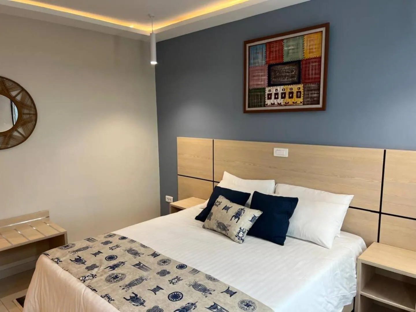 Bed in Palm Club Hotel