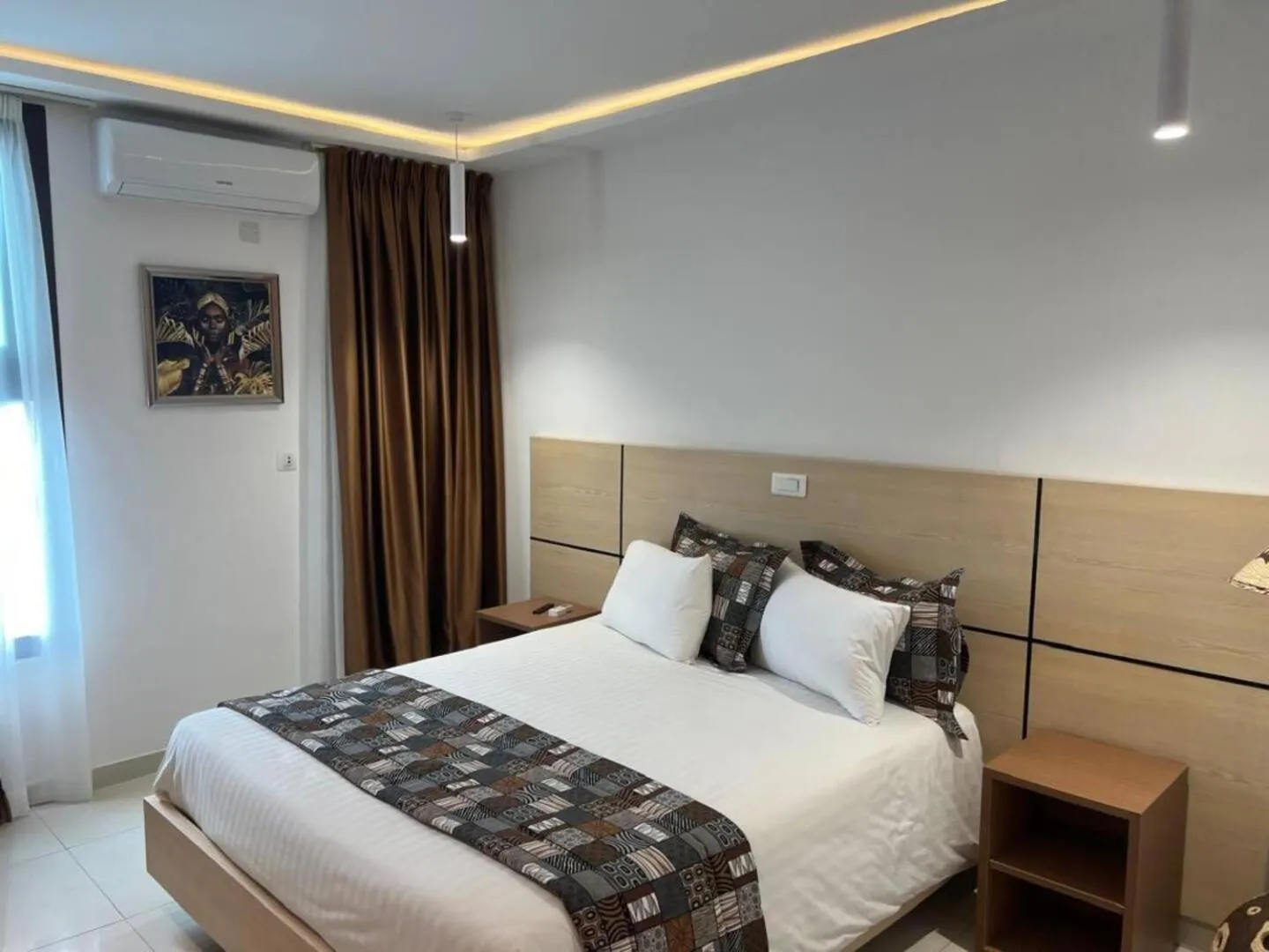 Bed in Palm Club Hotel