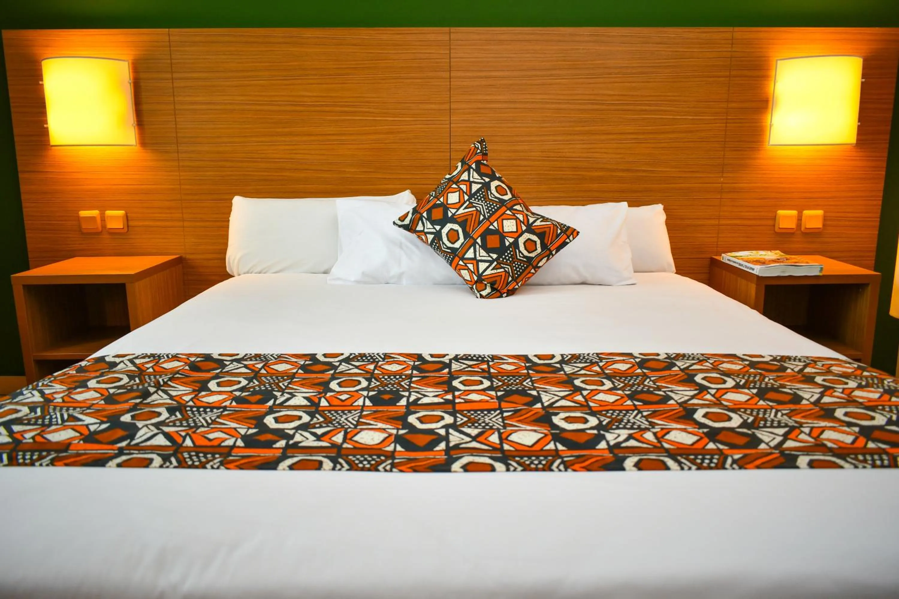 Bed in Palm Club Hotel