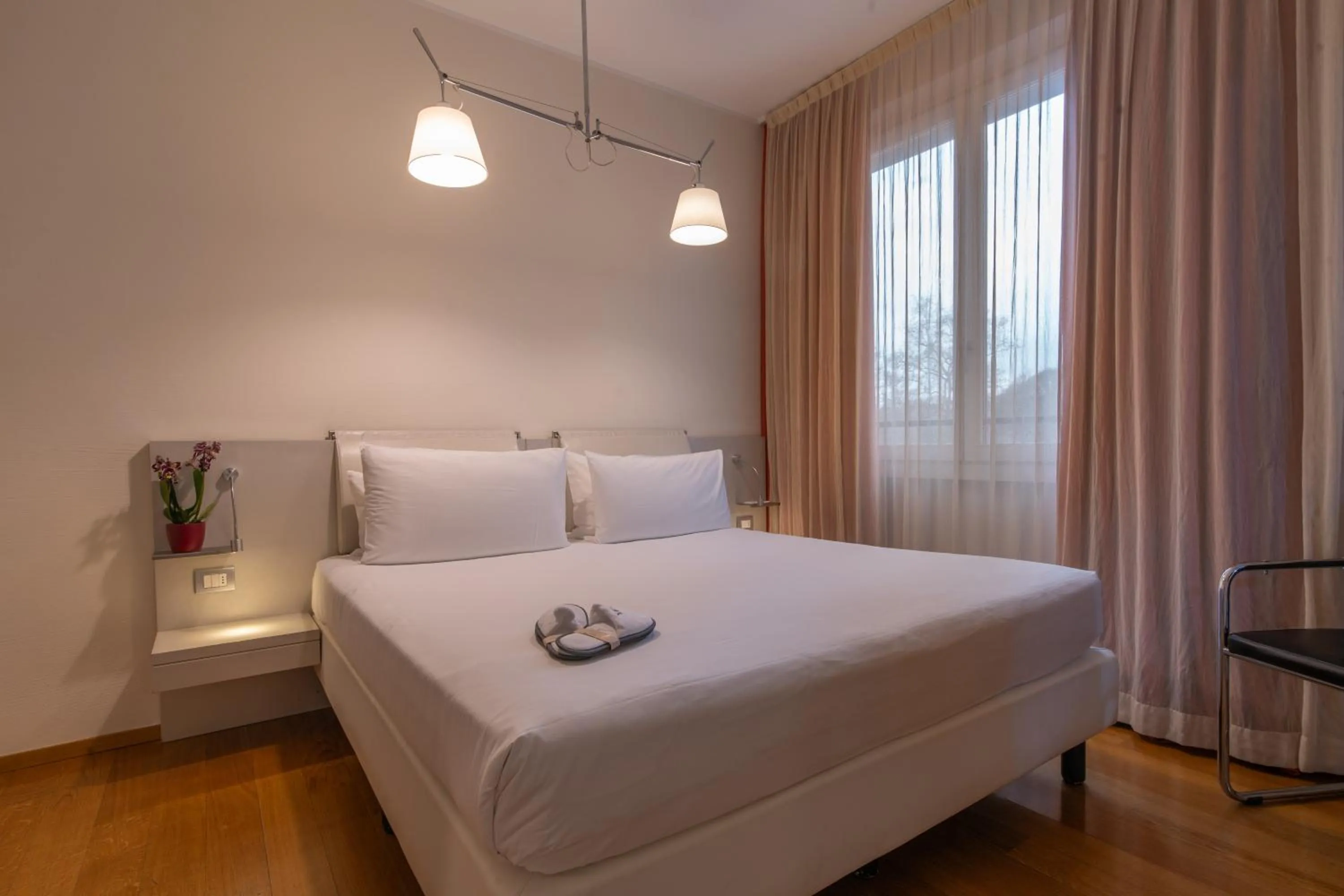 Bed in Hotel Mercure Milano Solari