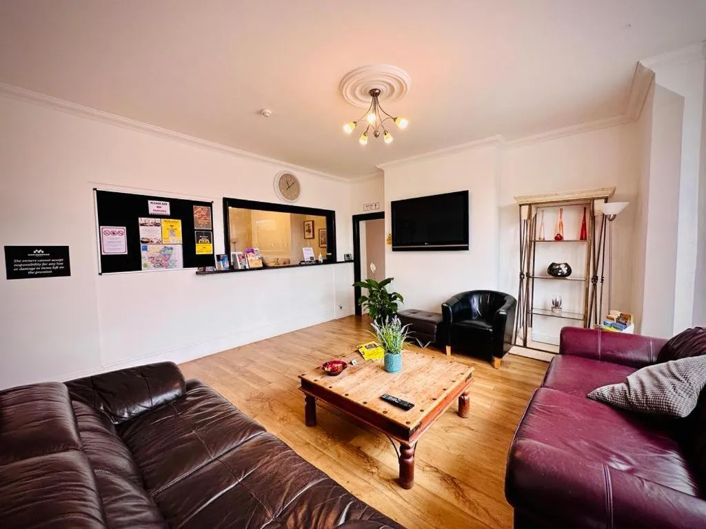Communal lounge/ TV room in Marlborough Hotel