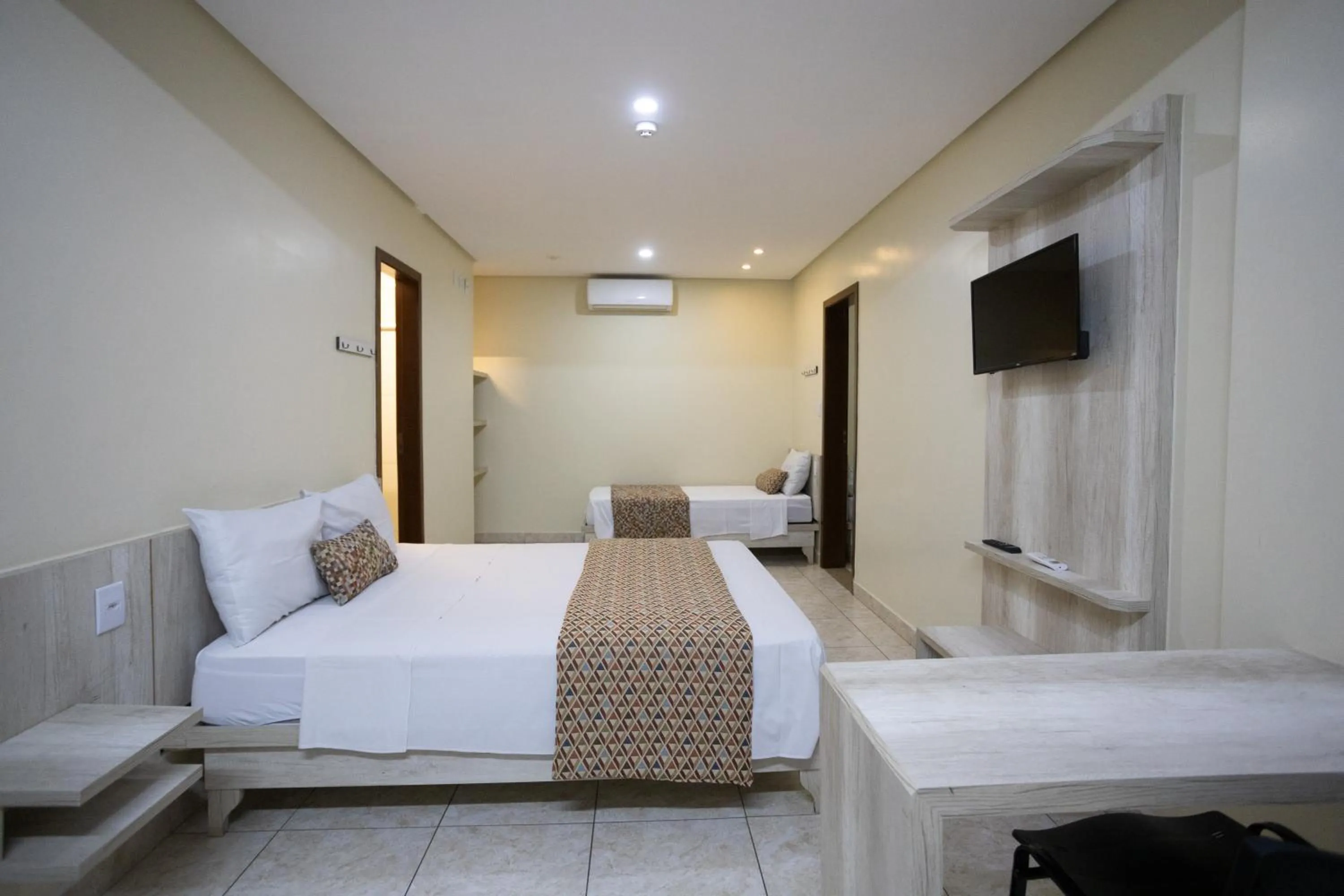 Bed in Infinity Hotel