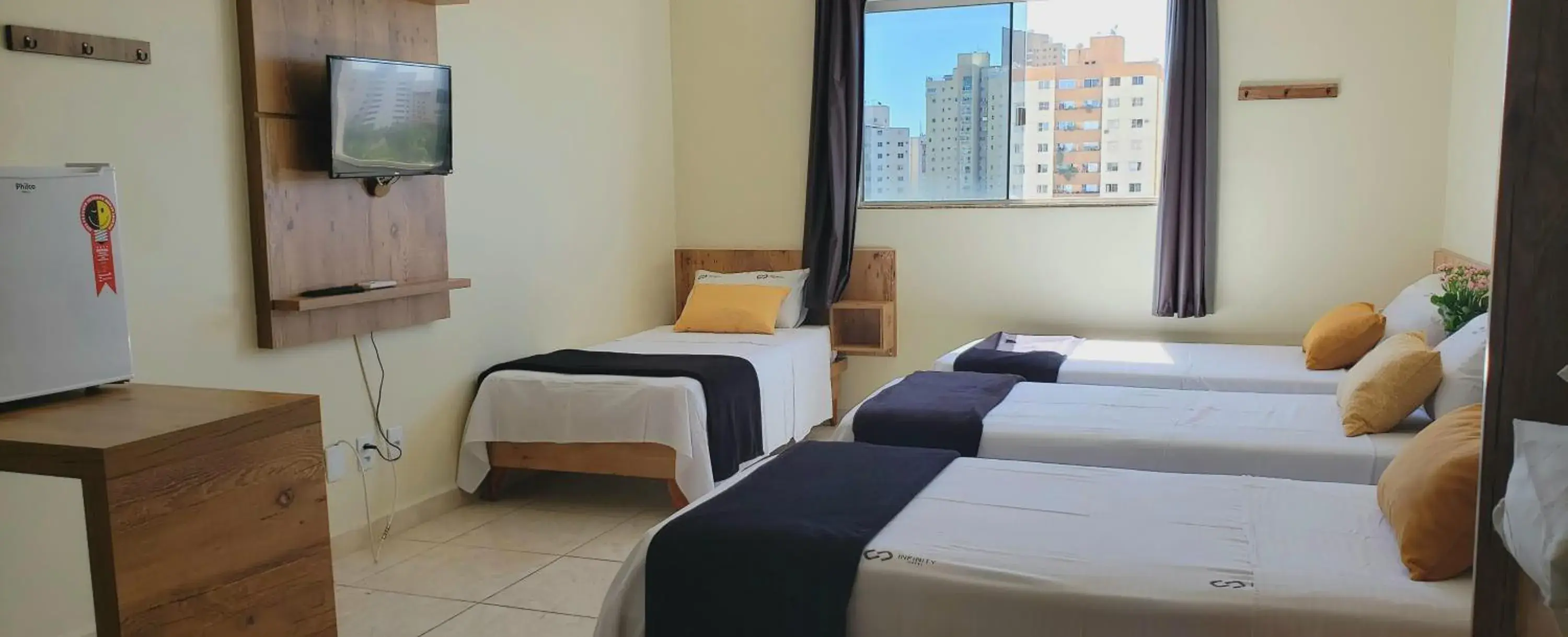 Standard Quadruple Room - single occupancy in Infinity Hotel Standard Quadruple Room - single occupancy in Infinity Hotel