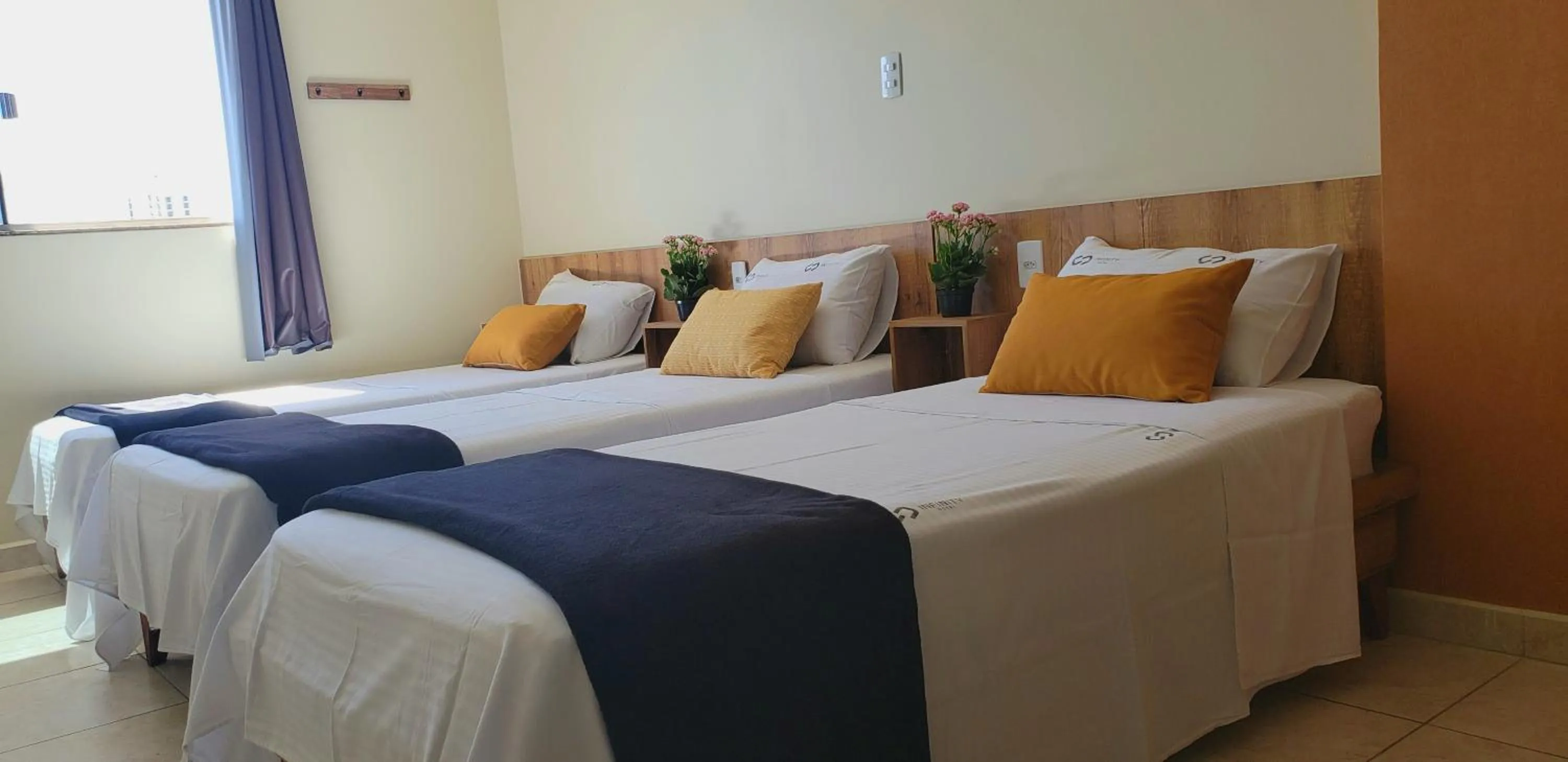 Bed in Infinity Hotel