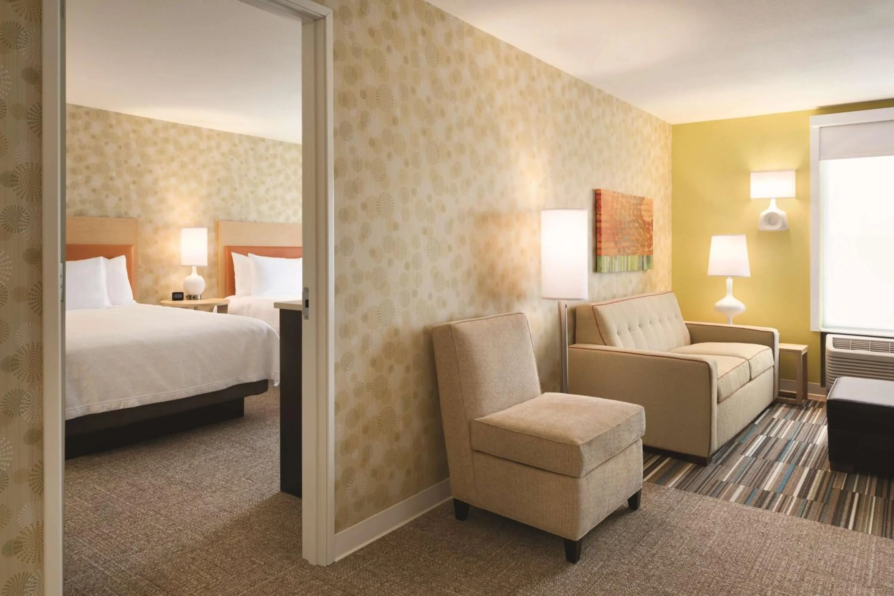 Living room, Bed in Home2 Suites By Hilton Iowa City Coralville